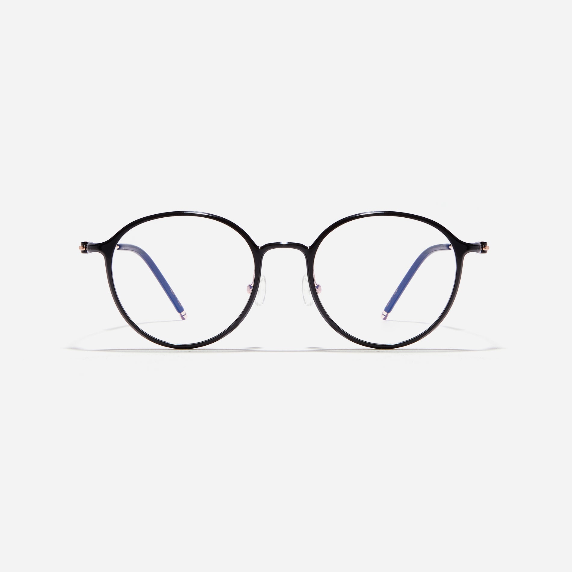 Ultra-lightweight round-shaped eyeglasses crafted using cutting-edge materials sourced from the French company ARKEMA. These glasses offer robust durability and consistently comfortable fit.