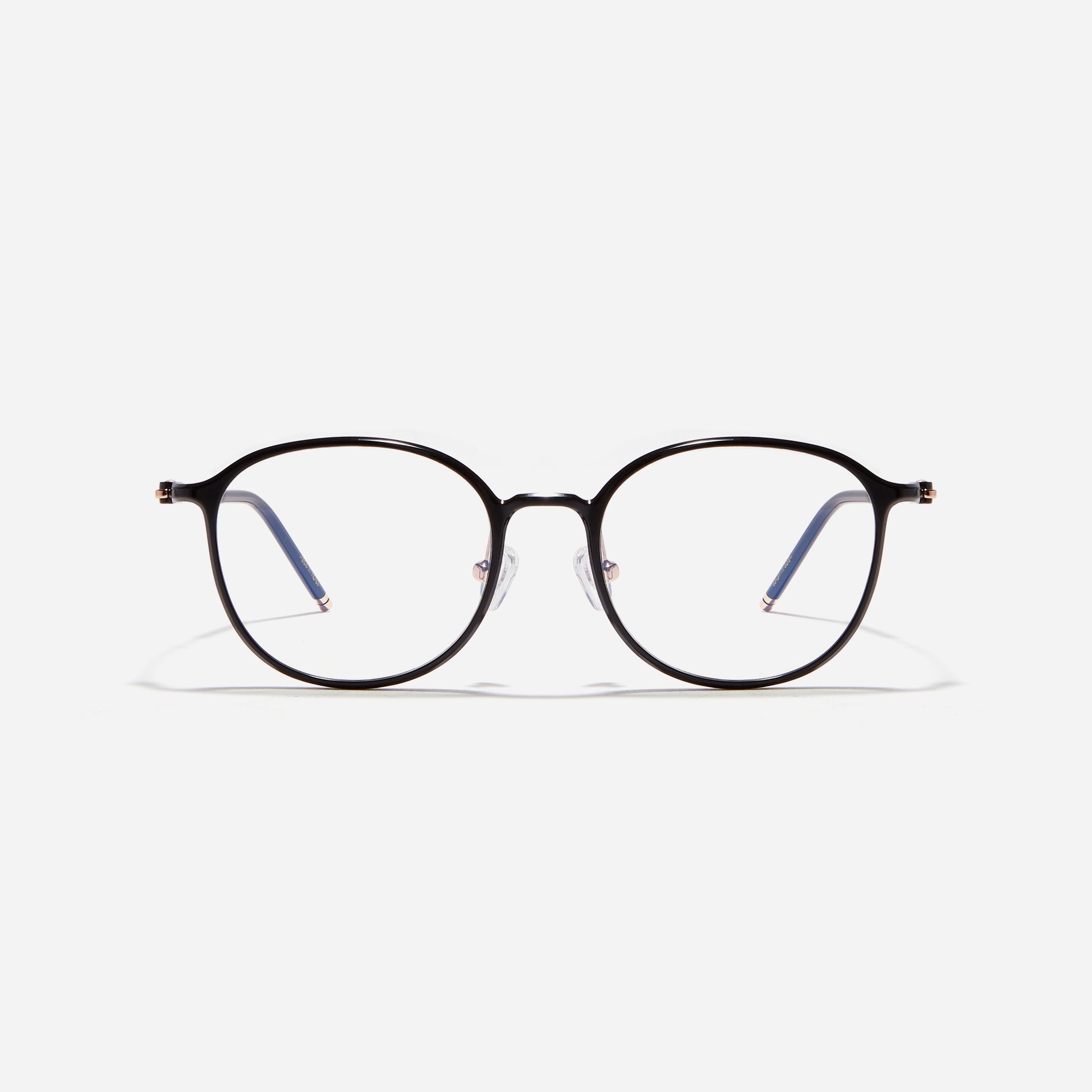 Ultra-lightweight round square-shaped eyeglasses crafted using cutting-edge materials sourced from the French company ARKEMA. These glasses offer robust durability and consistently comfortable fit.