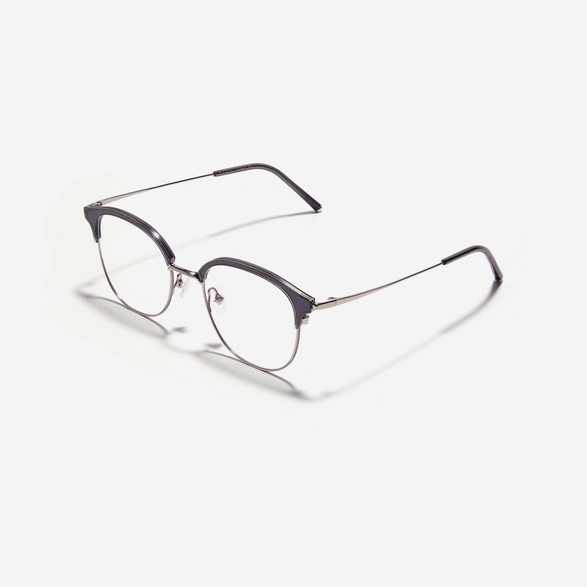 Oversized, square-shaped eyeglasses with a semi-rimless structure ideal for trendy styling and versatile wear.