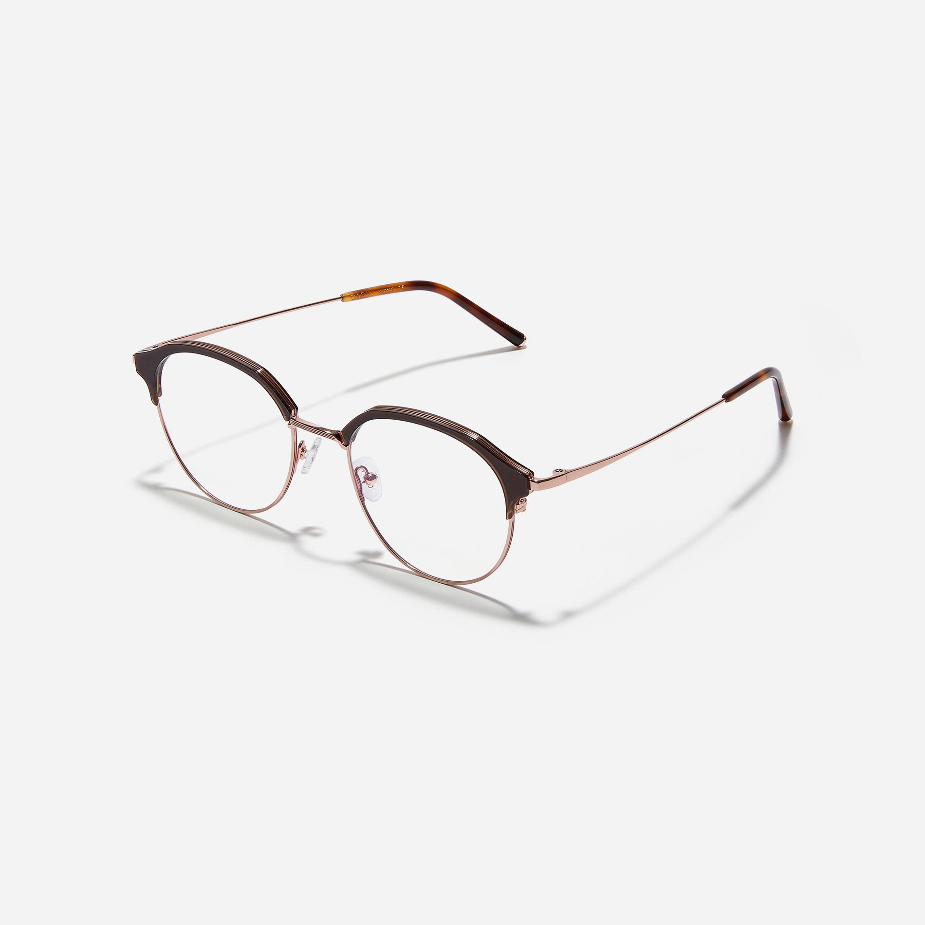 Oversized, round-shaped eyeglasses with a semi-rimless structure ideal for trendy styling and versatile wear.