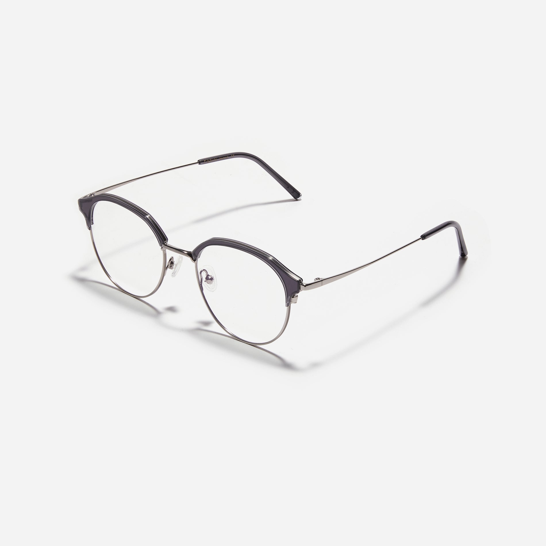 Oversized, round-shaped eyeglasses with a semi-rimless structure ideal for trendy styling and versatile wear.