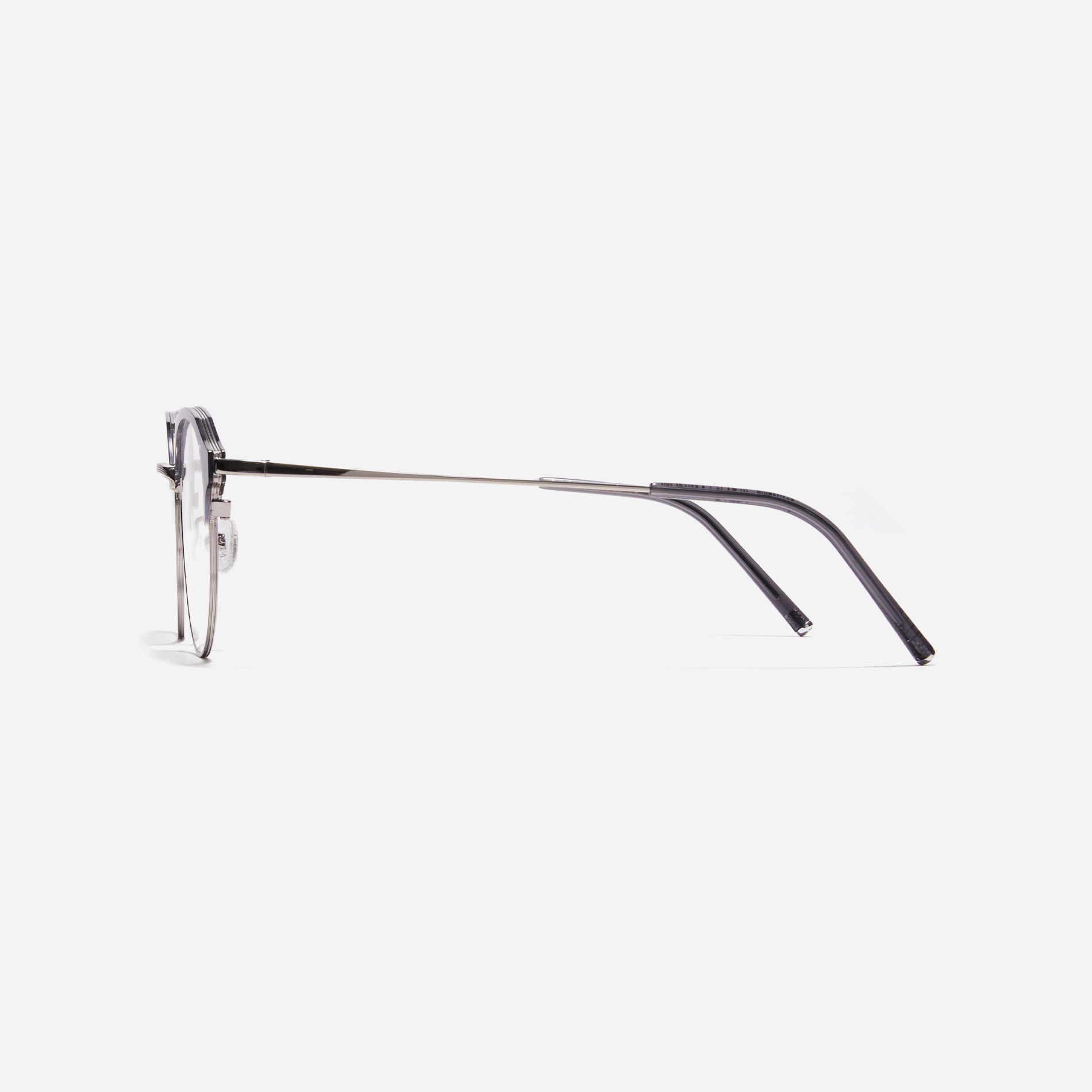 Oversized, round-shaped eyeglasses with a semi-rimless structure ideal for trendy styling and versatile wear.