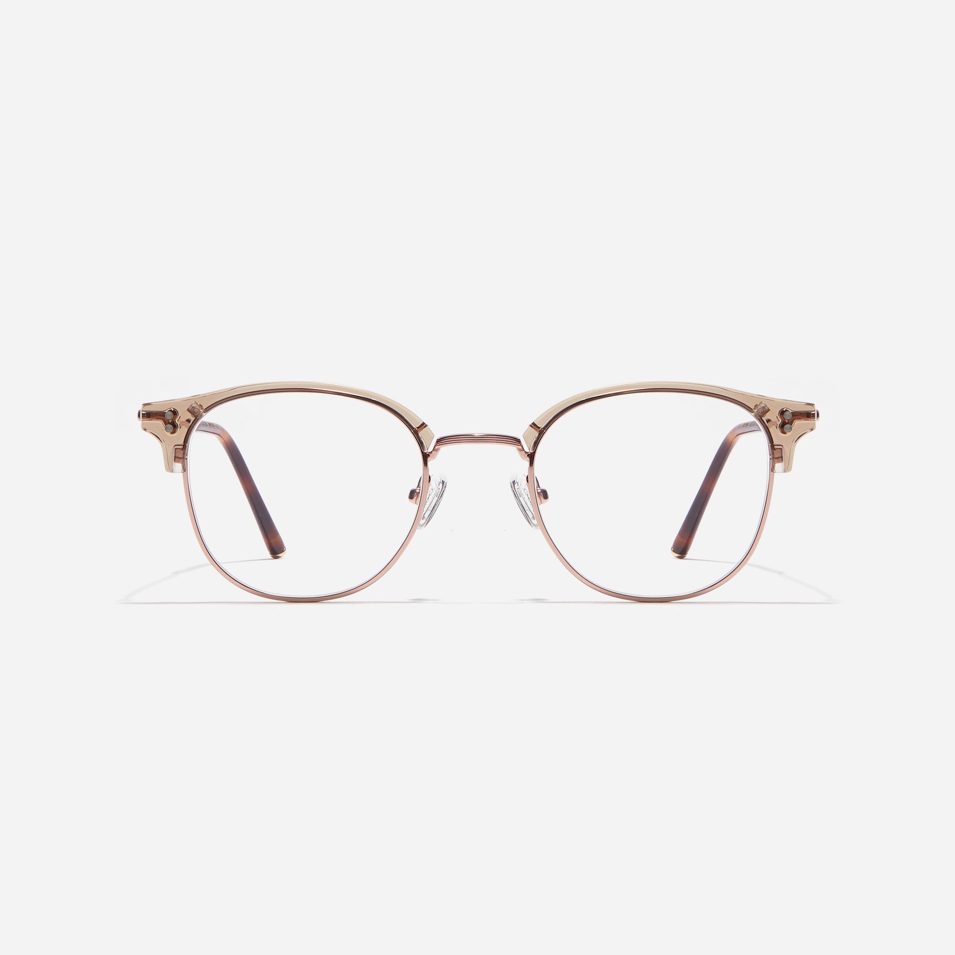 Square-shaped gold-rimmed eyeglasses. The frame, constructed from bioplastic and titanium, seamlessly merges exceptional durability with an ultra-lightweight build, while stylish nose bridge lining details enhance the overall design. The B-titanium temples deliver a lightweight and comfortable fit, guaranteeing prolonged wear without any discomfort.