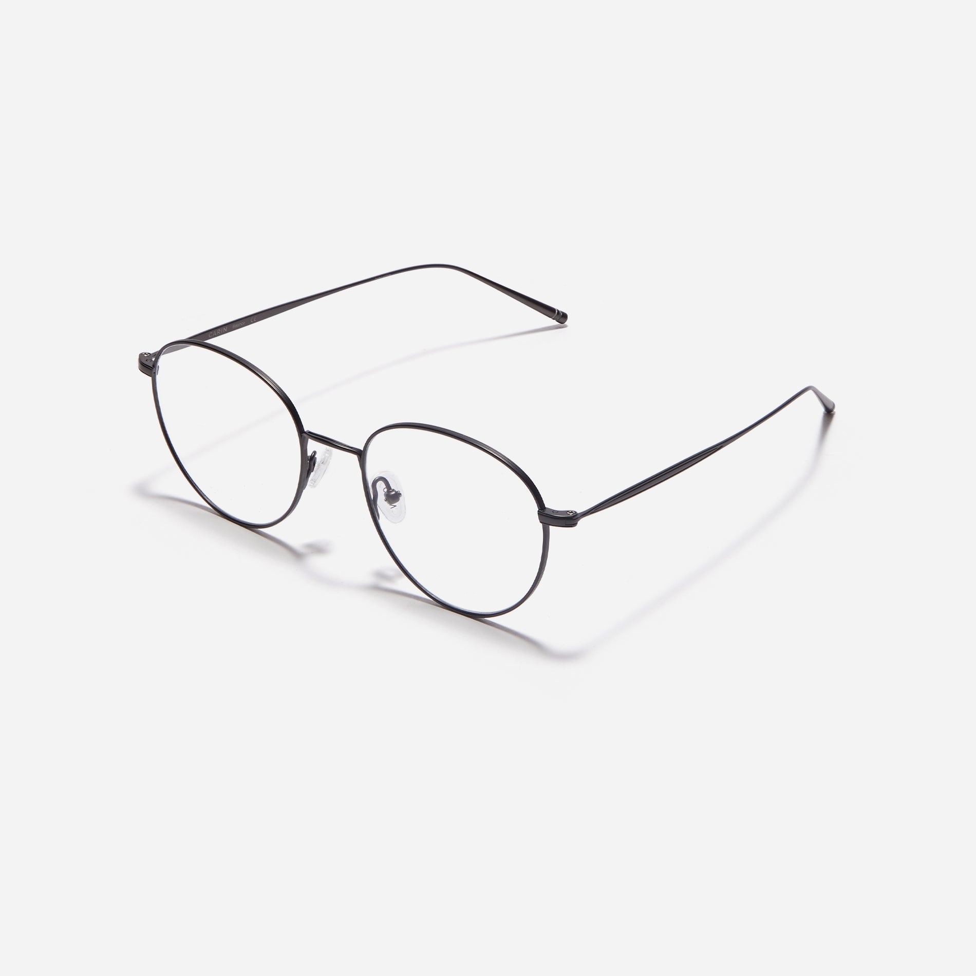 Boston-style round-shaped eyeglasses that naturally enhance one's facial features. Crafted entirely from titanium, they guarantee a lighter and more comfortable fit, while modern design makes them a perfect choice for those seeking a contemporary look.