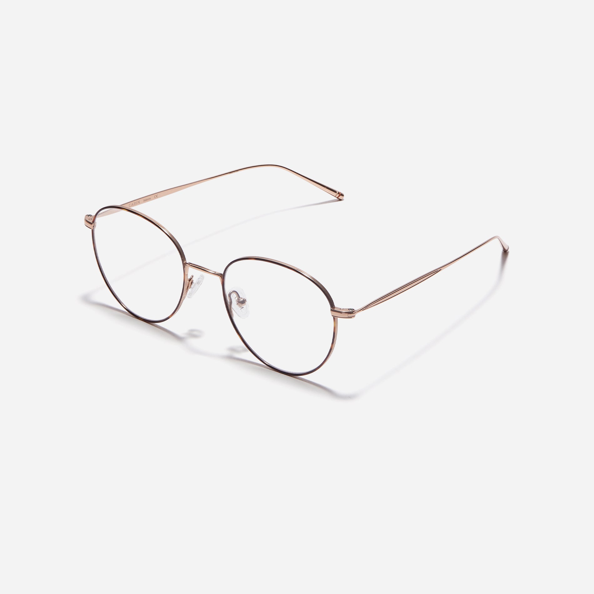 Boston-style round-shaped eyeglasses that naturally enhance one's facial features. Crafted entirely from titanium, they guarantee a lighter and more comfortable fit, while modern design makes them a perfect choice for those seeking a contemporary look.