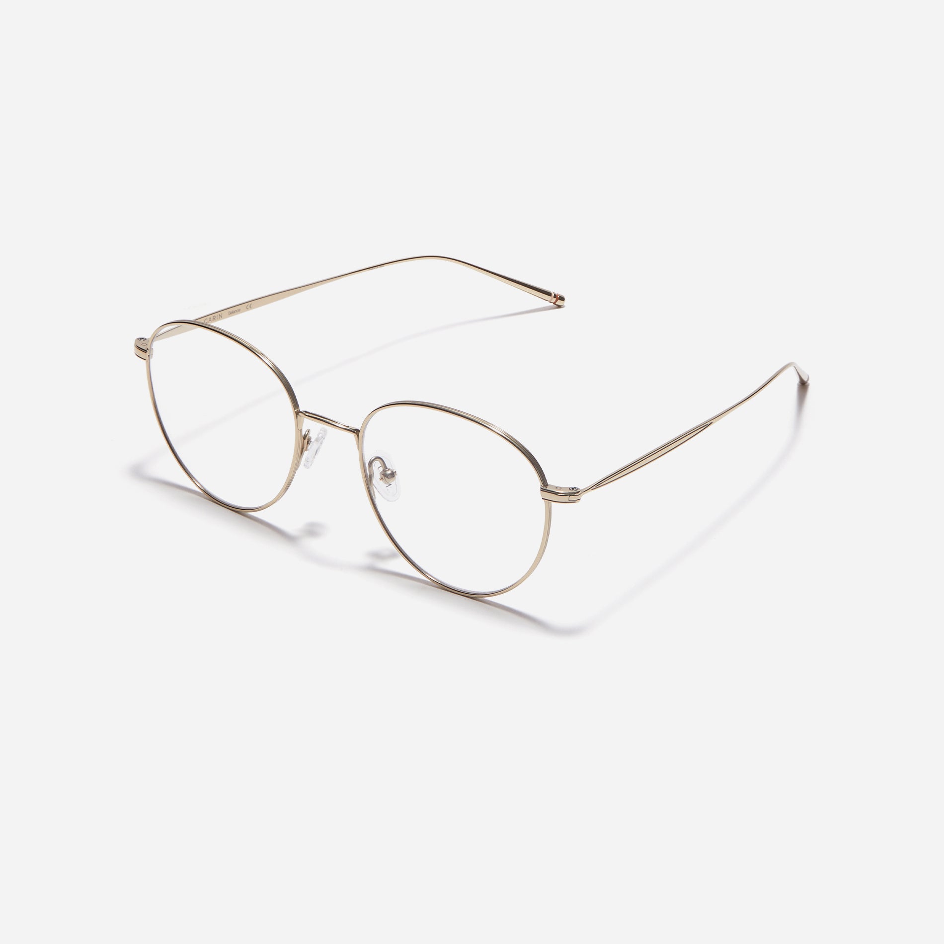 Boston-style round-shaped eyeglasses that naturally enhance one's facial features. Crafted entirely from titanium, they guarantee a lighter and more comfortable fit, while modern design makes them a perfect choice for those seeking a contemporary look.