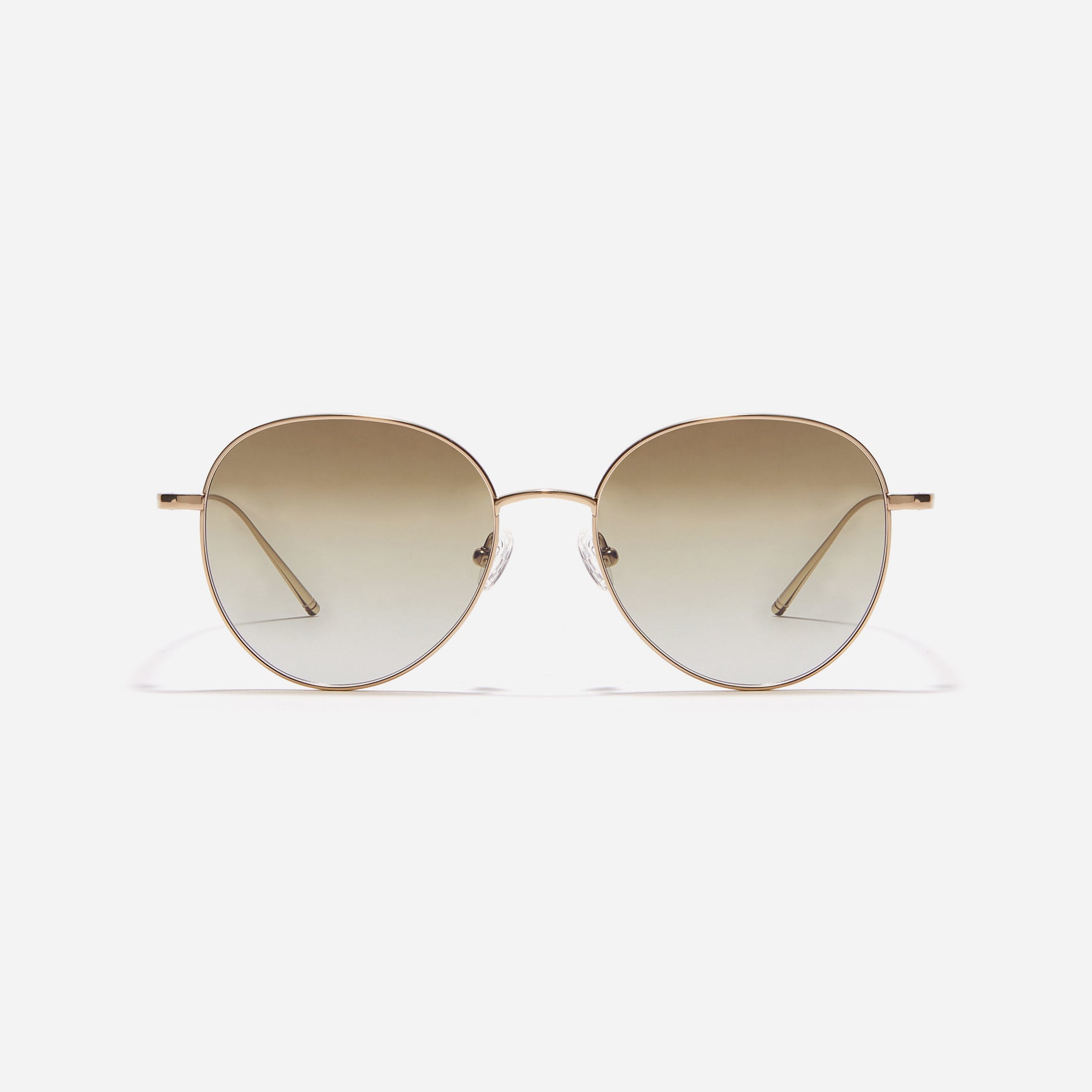 Round-shaped sunglasses crafted entirely from lightweight titanium. They feature semi-mirrored lenses that effectively reflect light, minimizing eye fatigue.