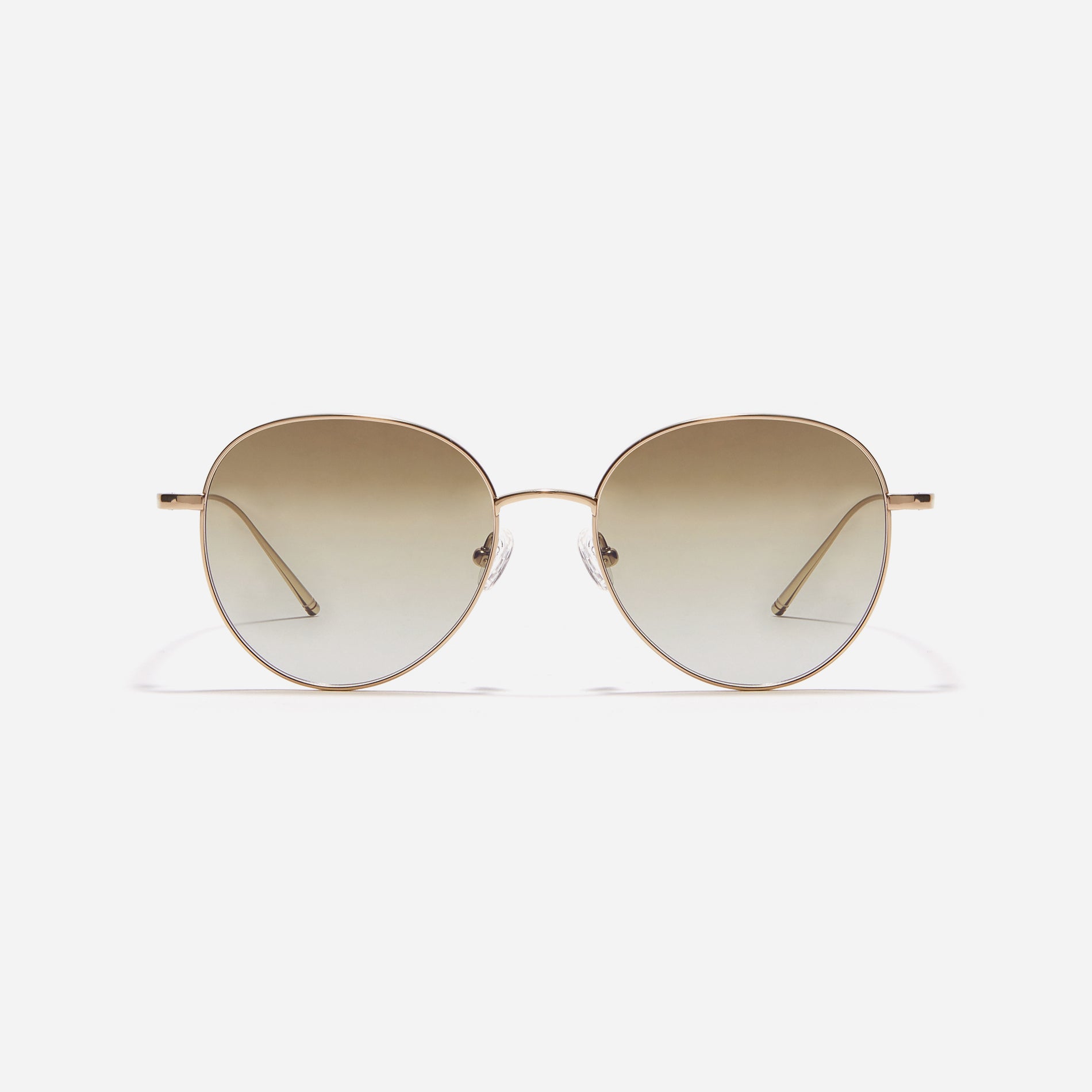 Round-shaped sunglasses crafted entirely from lightweight titanium. They feature semi-mirrored lenses that effectively reflect light, minimizing eye fatigue.