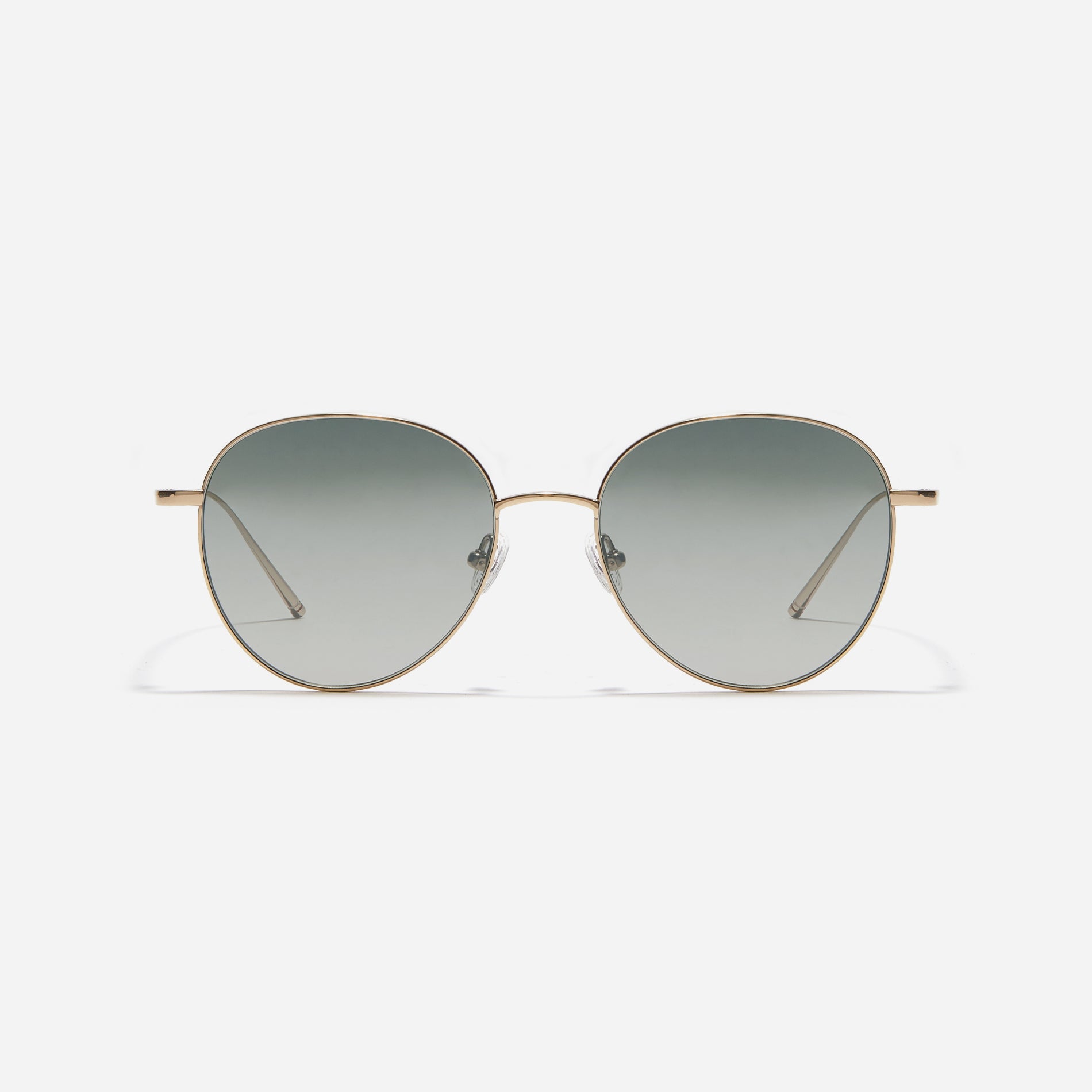 Round-shaped sunglasses crafted entirely from lightweight titanium. They feature semi-mirrored lenses that effectively reflect light, minimizing eye fatigue.