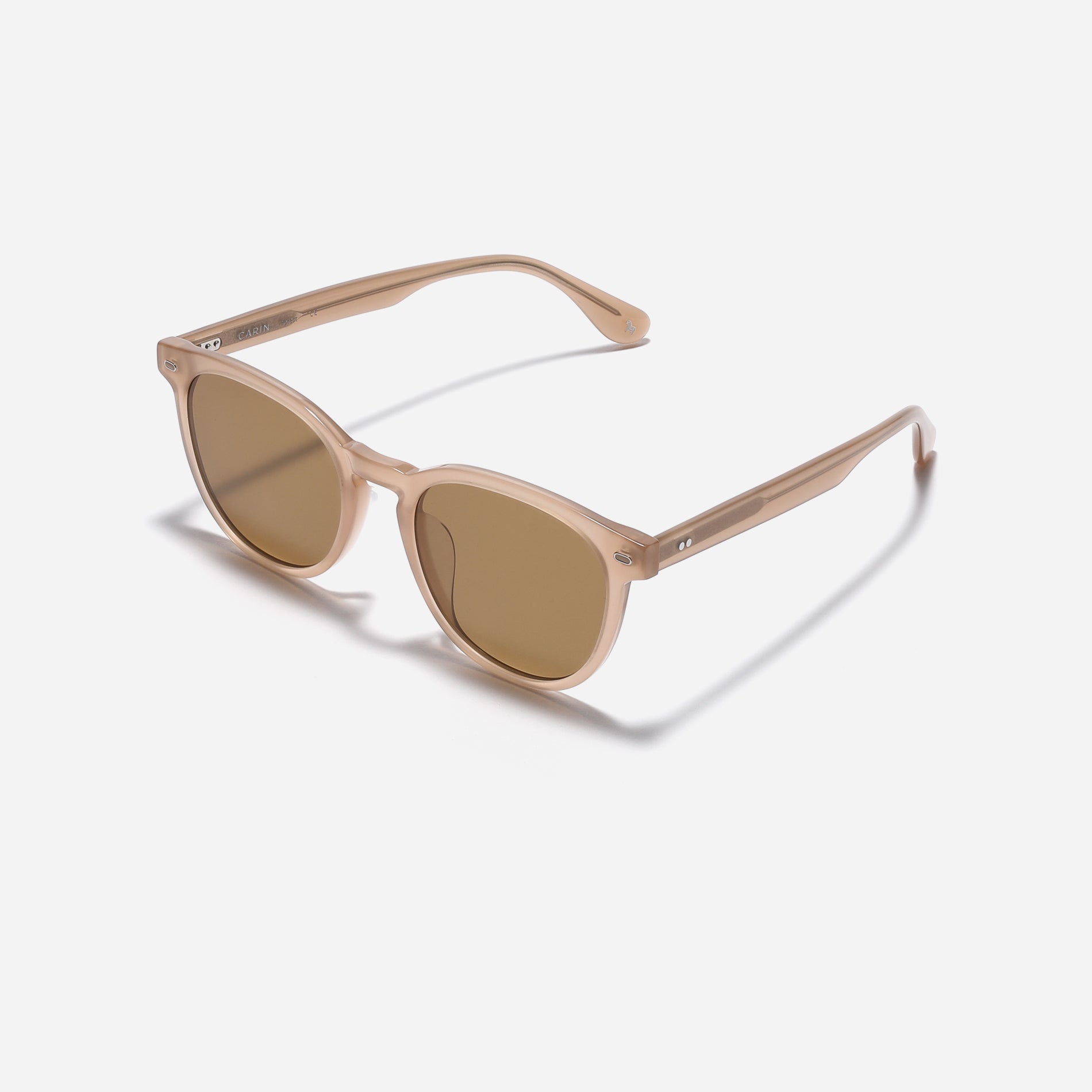 Round-shaped sunglasses from the Forest Line. With their soft form and stylish square frame, Connie offer a versatile and fashionable option for everyday wear, especially appealing to those new to sunglasses.