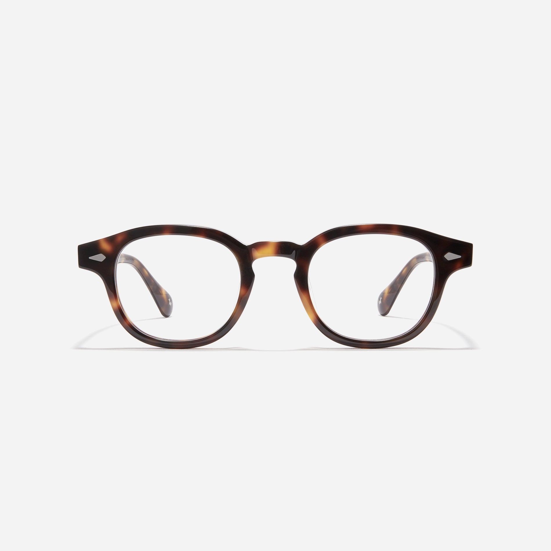 Round-shaped horn-rimmed eyeglasses featuring a sturdy and lightweight frame. Rena design incorporates dual lining on the tips to prevent slipping and ensure a consistently comfortable wearing experience.