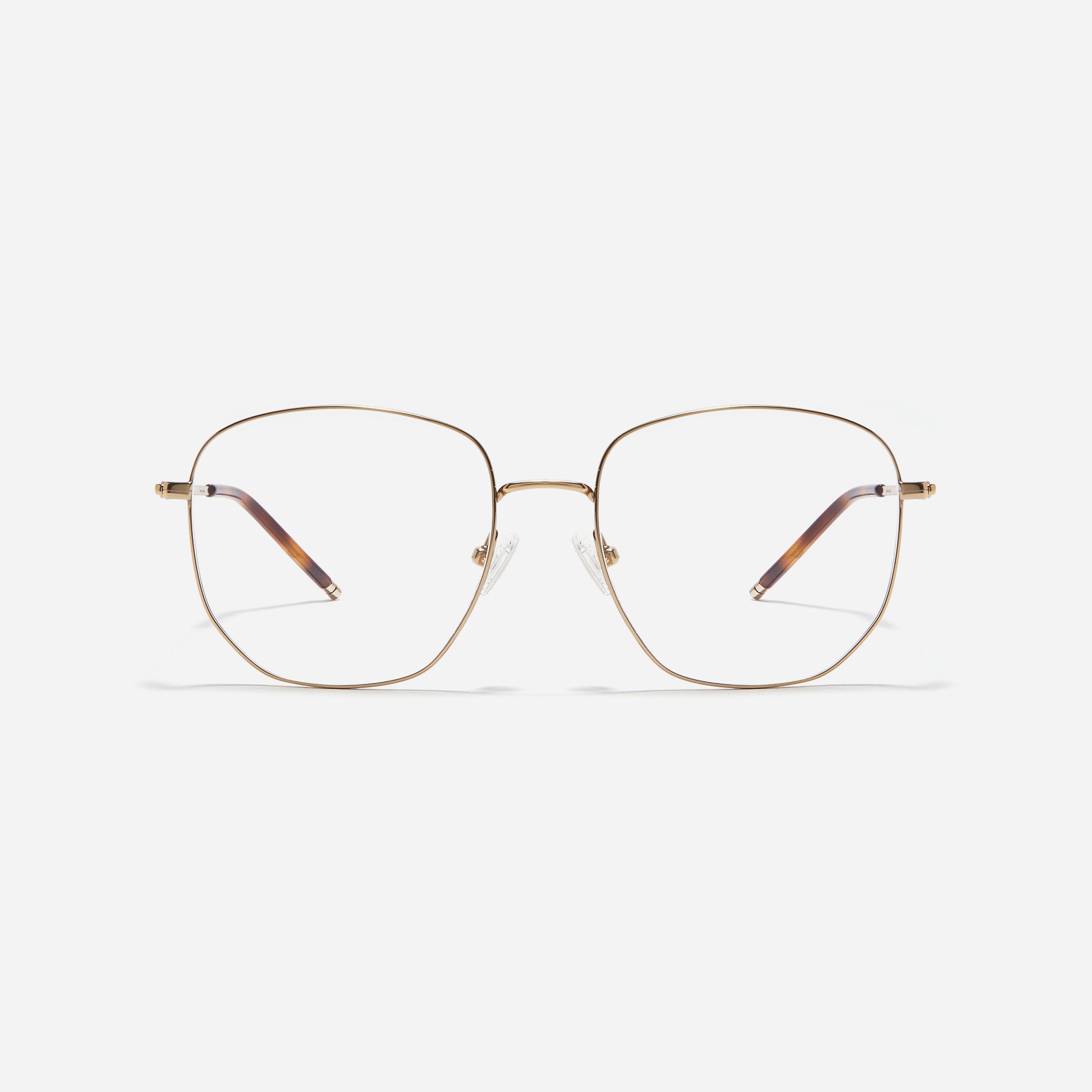 Square-shaped Boeing-style oversized eyeglasses crafted entirely from titanium for a lighter and more comfortable fit. With classic color options and frame design, these eyeglasses offer a retro style that effortlessly complements one's look.