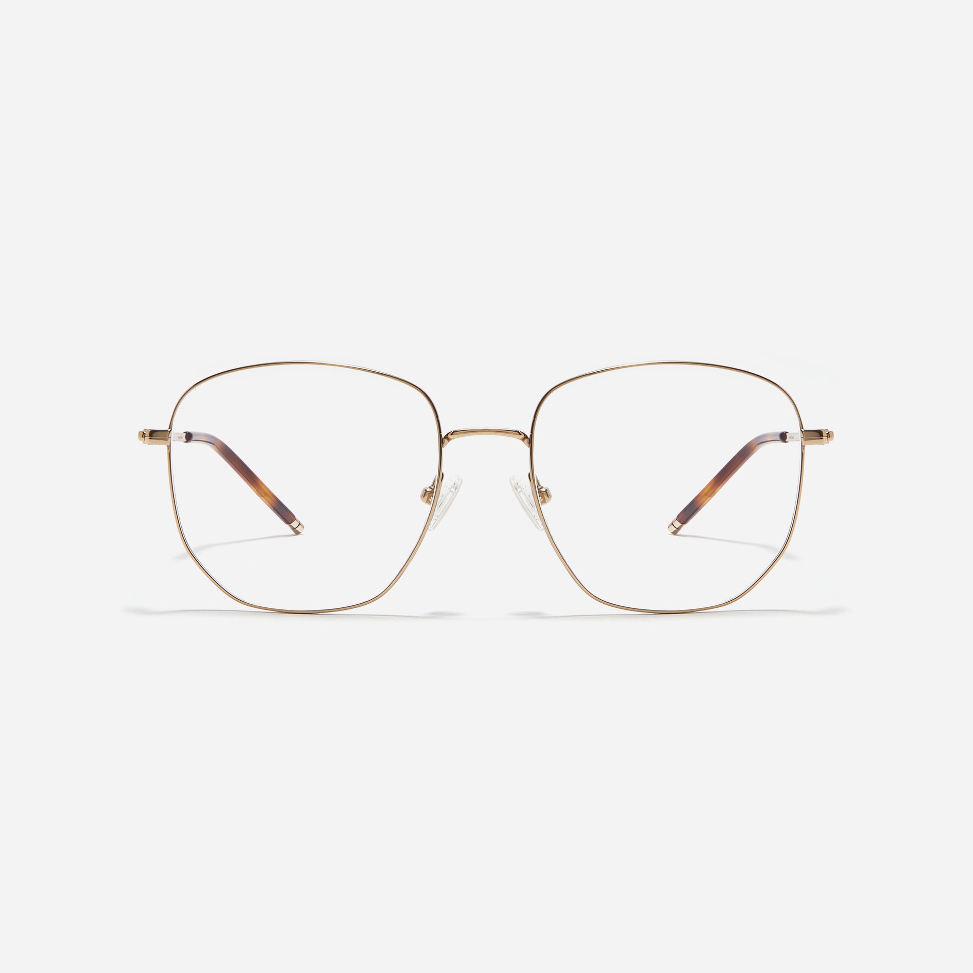 Square-shaped Boeing-style oversized eyeglasses crafted entirely from titanium for a lighter and more comfortable fit. With classic color options and frame design, these eyeglasses offer a retro style that effortlessly complements one's look.