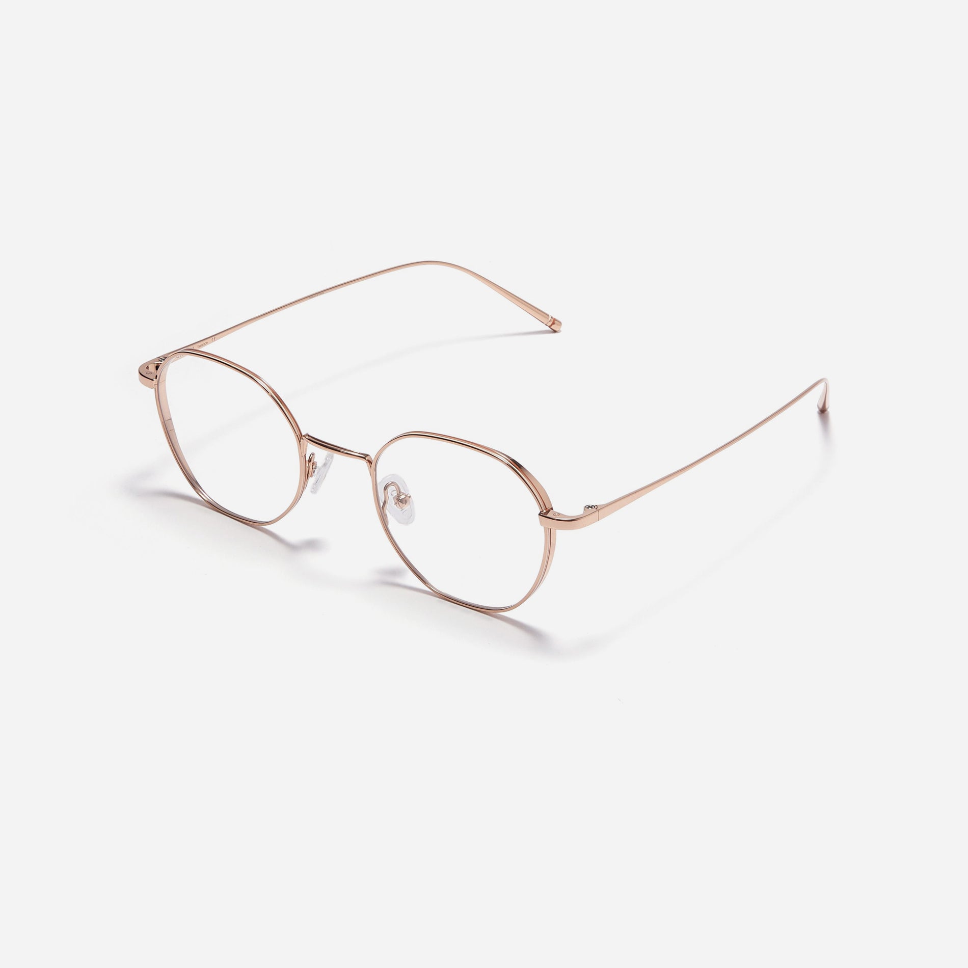 Hexagonal-shaped, full-metal eyeglasses with a dual-rim structure designed to accommodate thicker, high-prescription lenses. Both the frame and temples are made of pure titanium, ensuring a lightweight and comfortable fit.