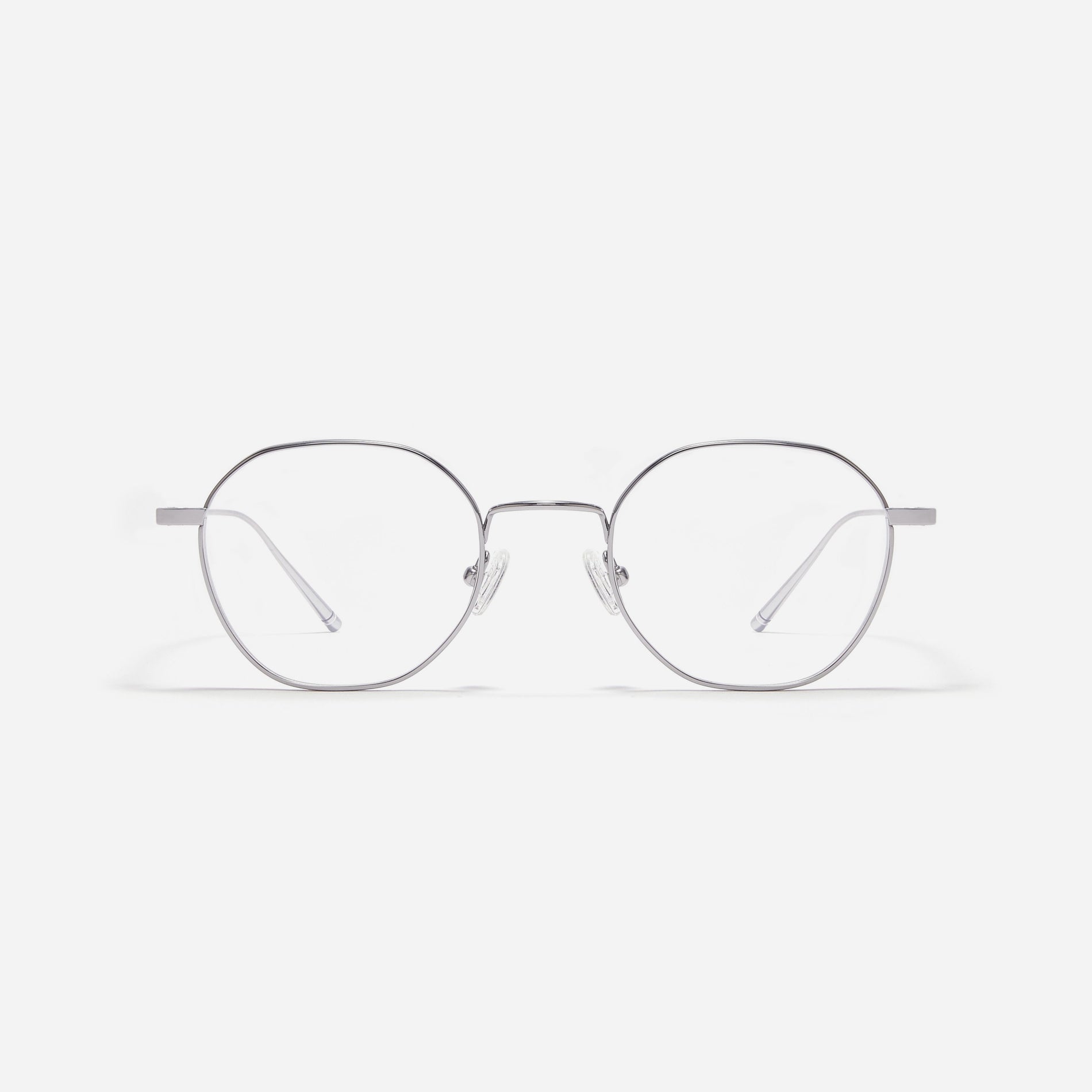 Hexagonal-shaped, full-metal eyeglasses with a dual-rim structure designed to accommodate thicker, high-prescription lenses. Both the frame and temples are made of pure titanium, ensuring a lightweight and comfortable fit.