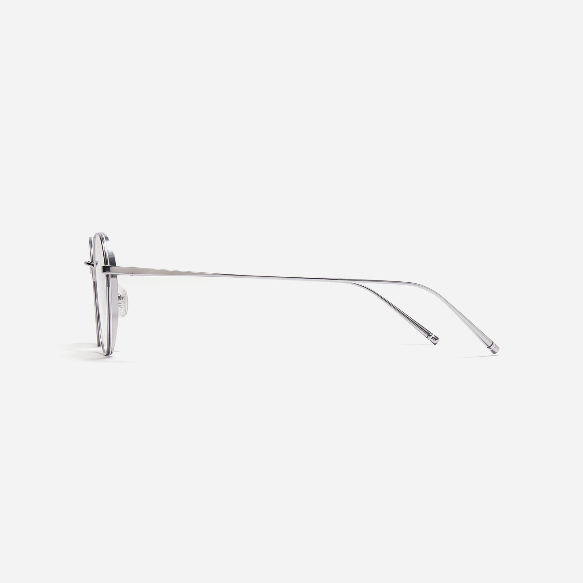 Hexagonal-shaped, full-metal eyeglasses with a dual-rim structure designed to accommodate thicker, high-prescription lenses. Both the frame and temples are made of pure titanium, ensuring a lightweight and comfortable fit.