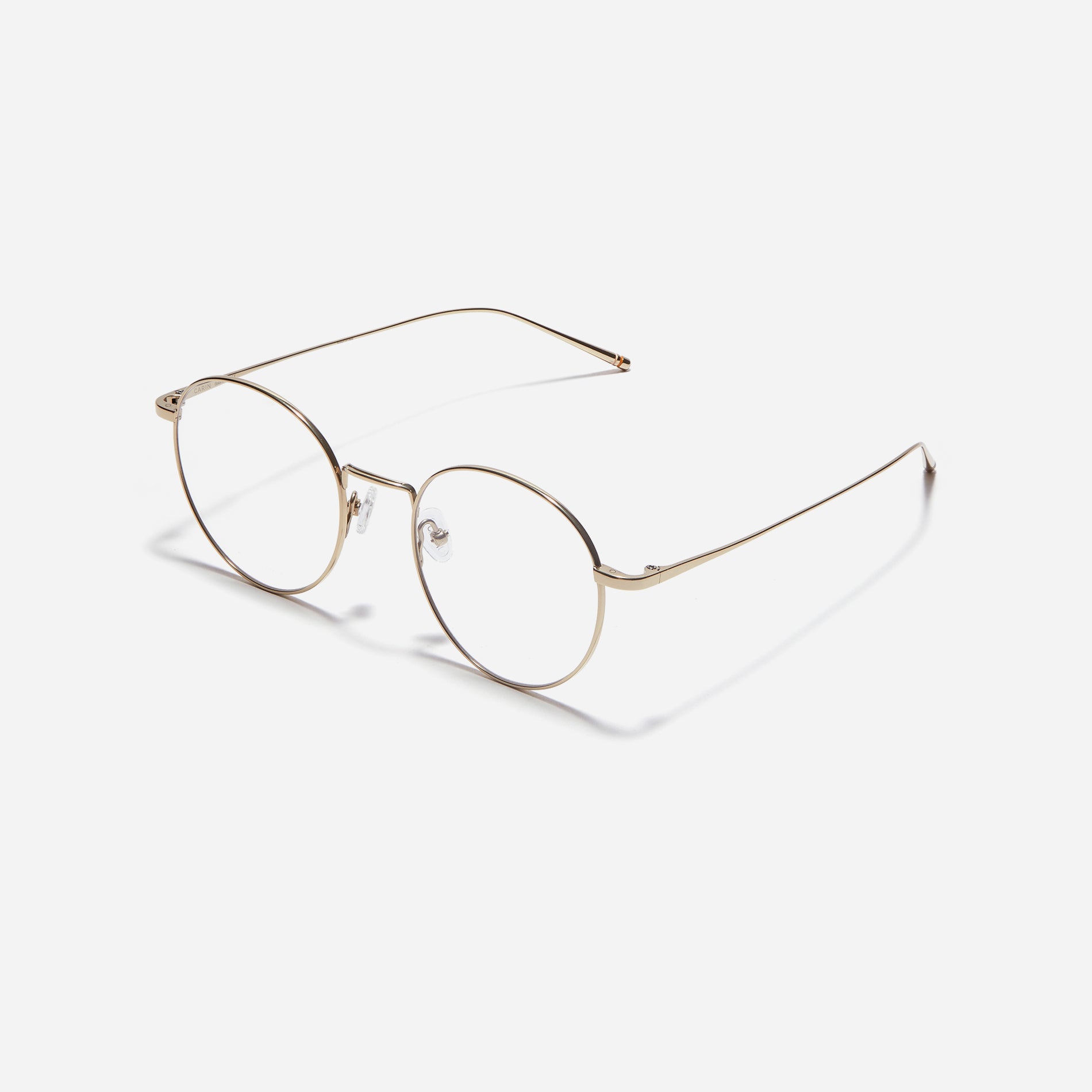 Round-shaped eyeglasses that naturally complement all face shapes. Crafted entirely from titanium, the frame provides exceptional durability and featherweight comfort, while its design adds a touch of casual charm to one's daily style.