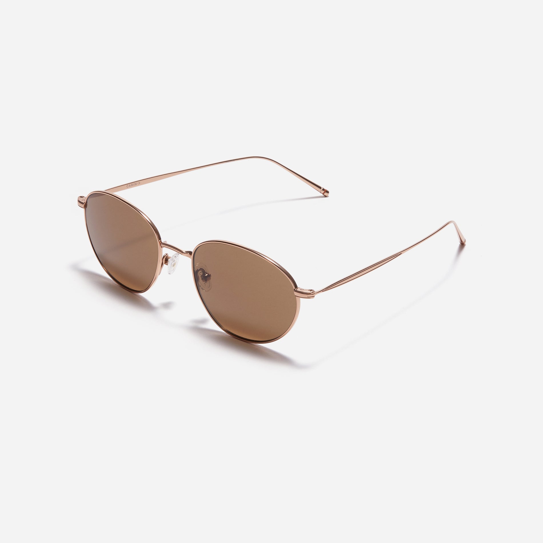 Idell sunglasses feature sleek metal frame with a narrow design. Crafted entirely from titanium, they guarantee a lightweight and comfortable fit. Available in color variations that naturally complement facial features, they provide a soft and versatile style for everyday wear.