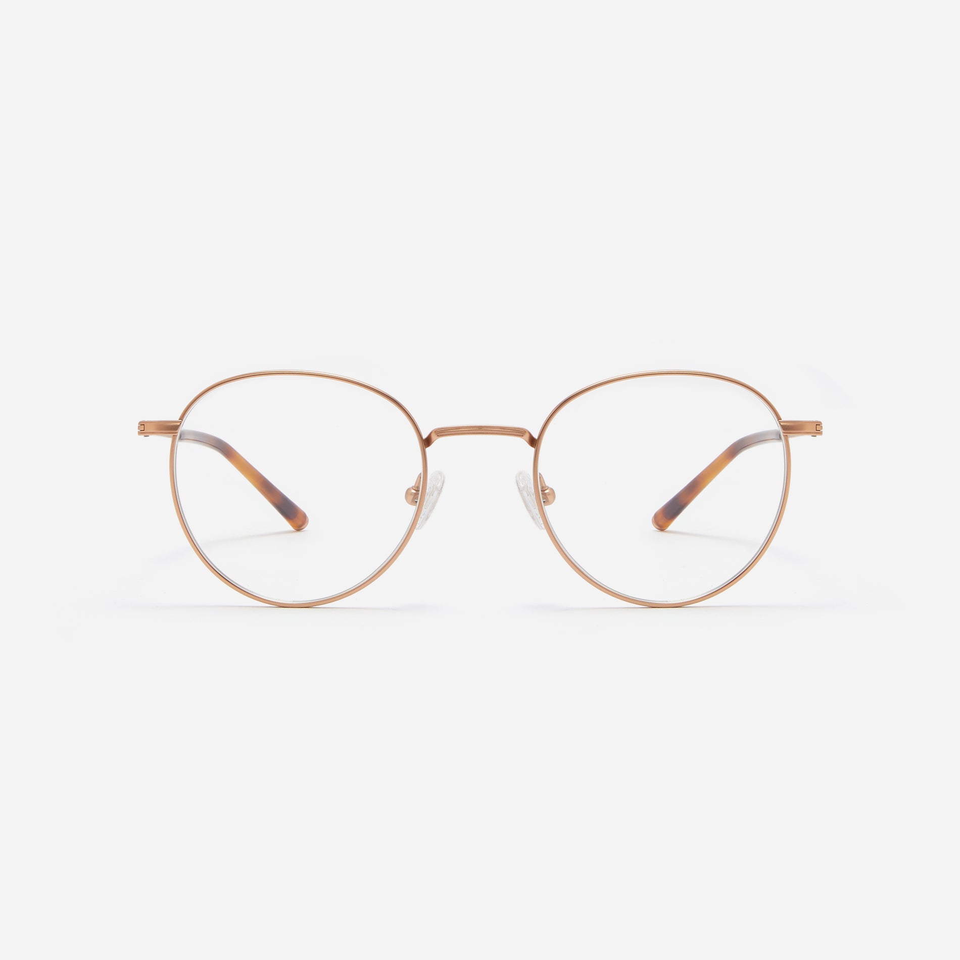 Round-shaped blue light blocking eyeglasses. Crafted entirely from pure titanium, they offer a lightweight and comfortable wearing experience. The three-dimensional lining details on the frame and temples, combined with epoxy and matte plating, enhance its classic ambiance.