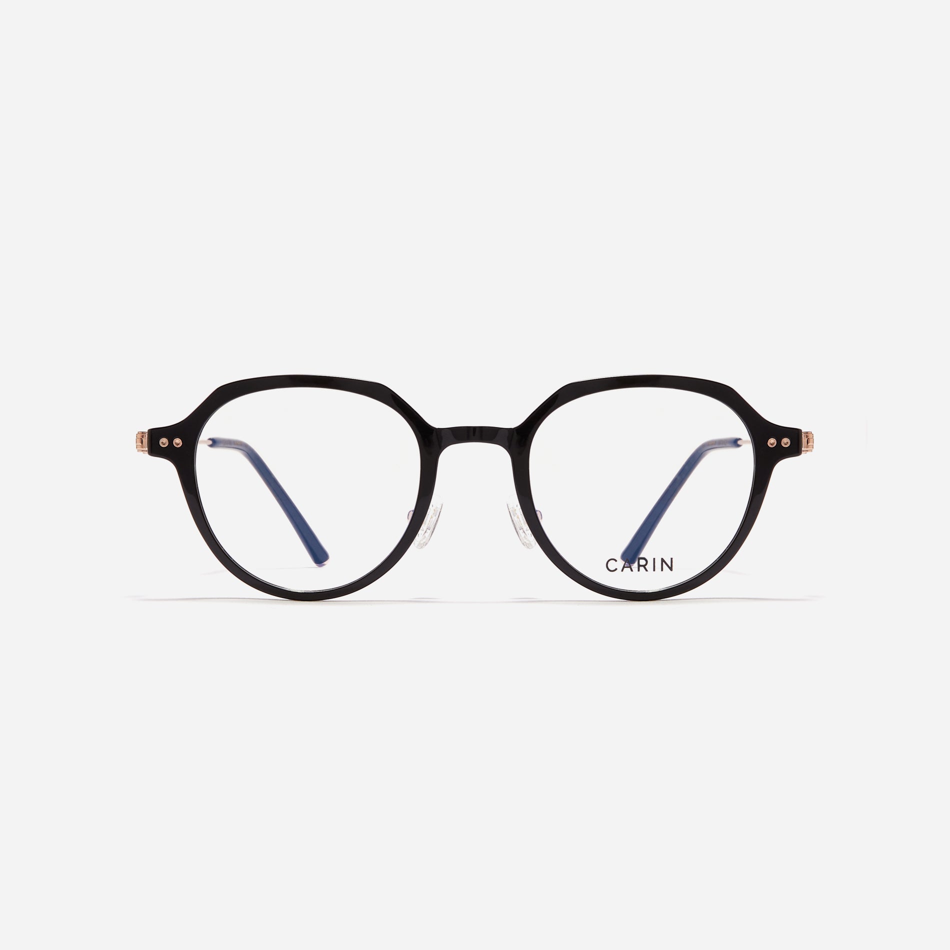 Polygonal-shaped eyeglasses crafted with a blend of G850 bio-plastic and stainless steel, ensuring resilience against breakage. Incorporated with CARIN's patented anti-loosening hinge technology, these eyeglasses ensure a consistently comfortable fit.