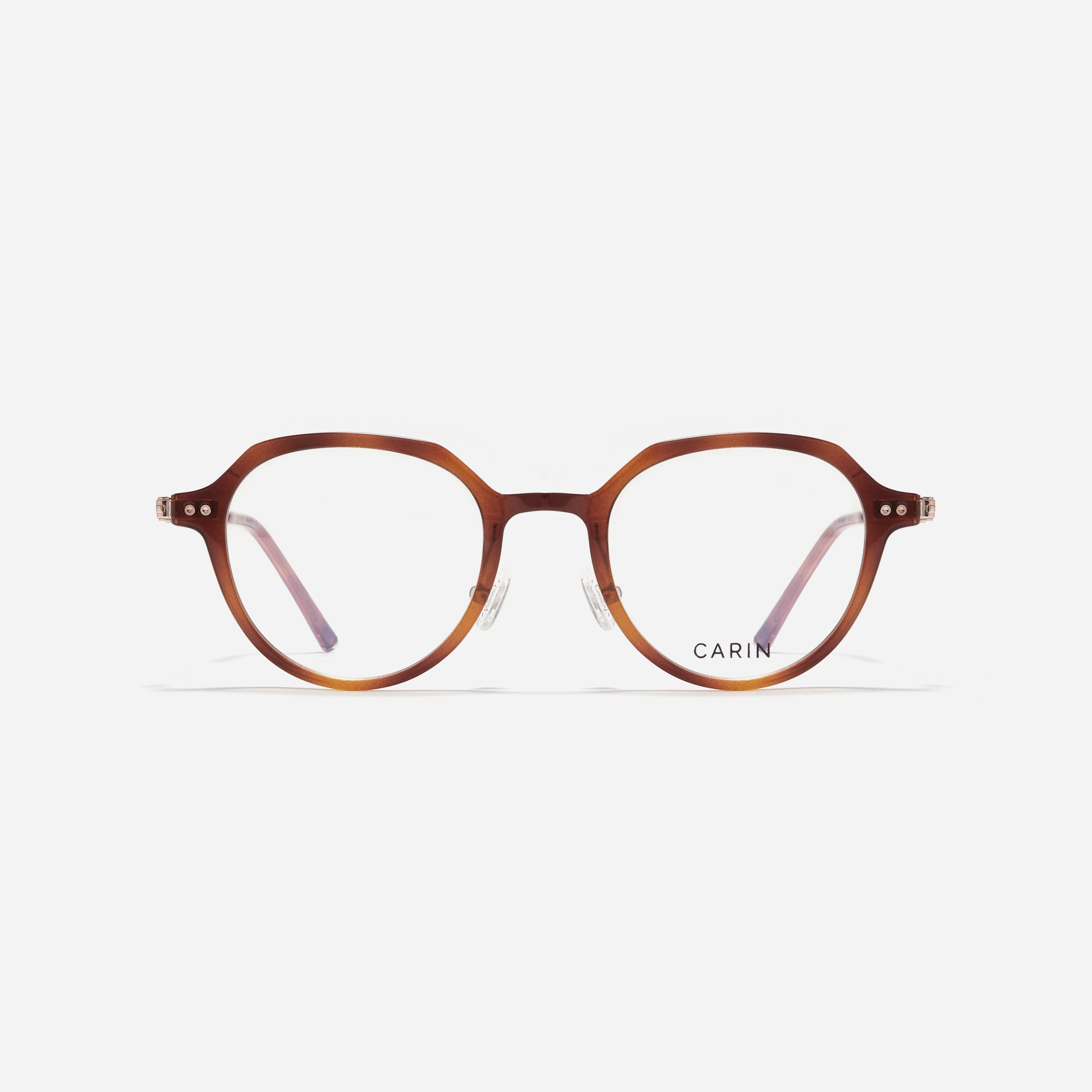 Polygonal-shaped eyeglasses crafted with a blend of G850 bio-plastic and stainless steel, ensuring resilience against breakage. Incorporated with CARIN's patented anti-loosening hinge technology, these eyeglasses ensure a consistently comfortable fit.