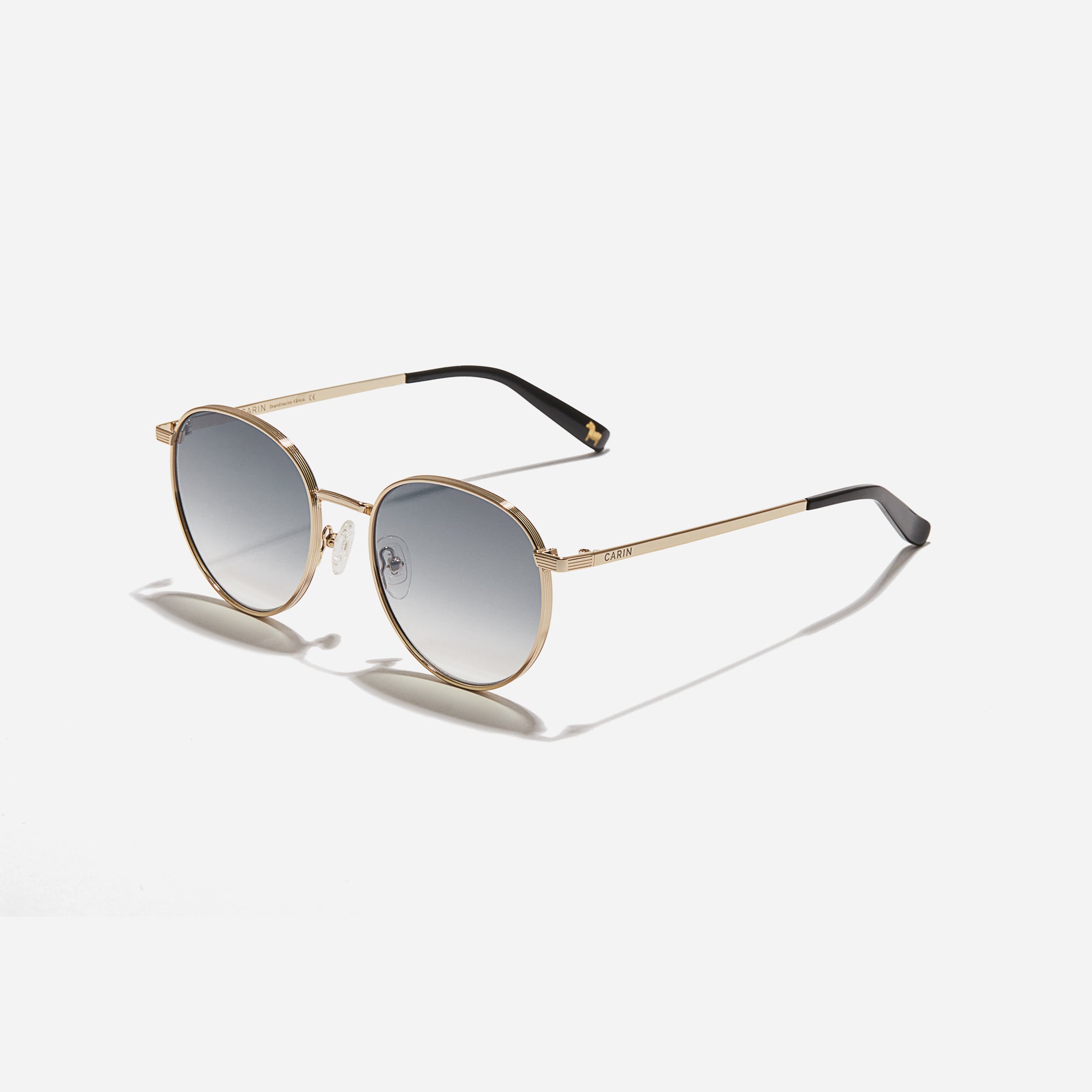 Boeing-style sunglasses featuring chic temple details and half-mirrored lens coating that reduces glare and provides 100% UV protection.