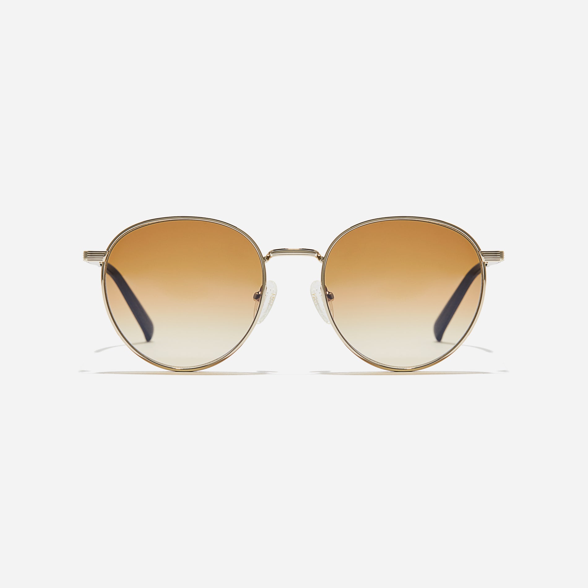  Boeing-style sunglasses featuring chic temple details and half-mirrored lens coating that reduces glare and provides 100% UV protection.