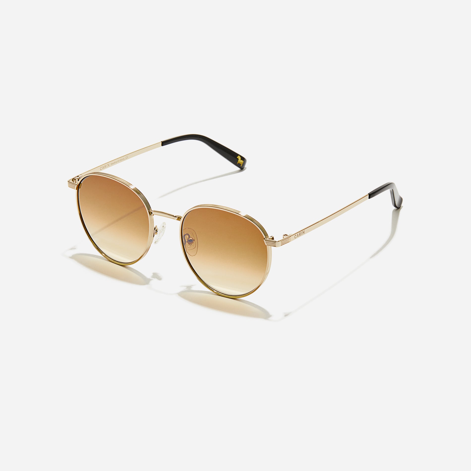 Boeing-style sunglasses featuring chic temple details and half-mirrored lens coating that reduces glare and provides 100% UV protection.