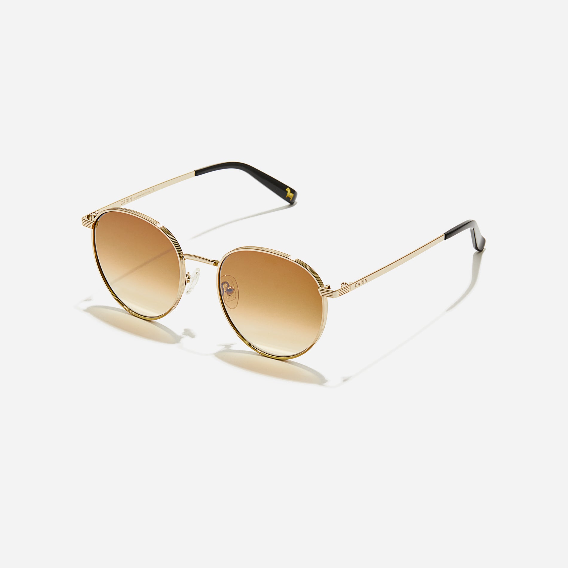  Boeing-style sunglasses featuring chic temple details and half-mirrored lens coating that reduces glare and provides 100% UV protection.