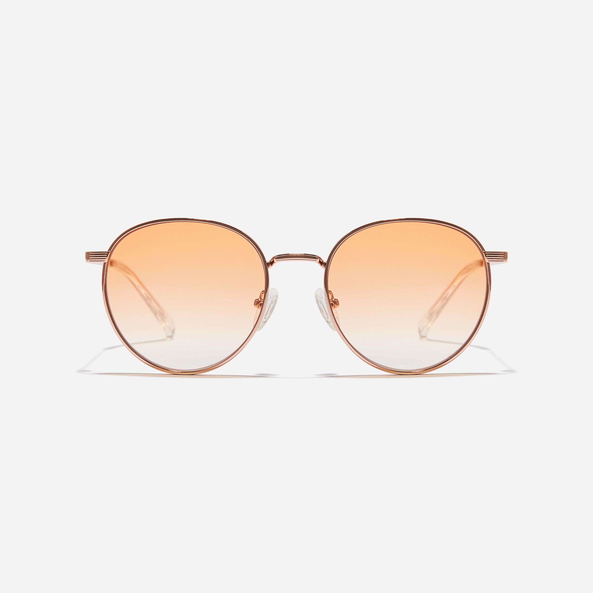 Boeing-style sunglasses featuring chic temple details and half-mirrored lens coating that reduces glare and provides 100% UV protection.