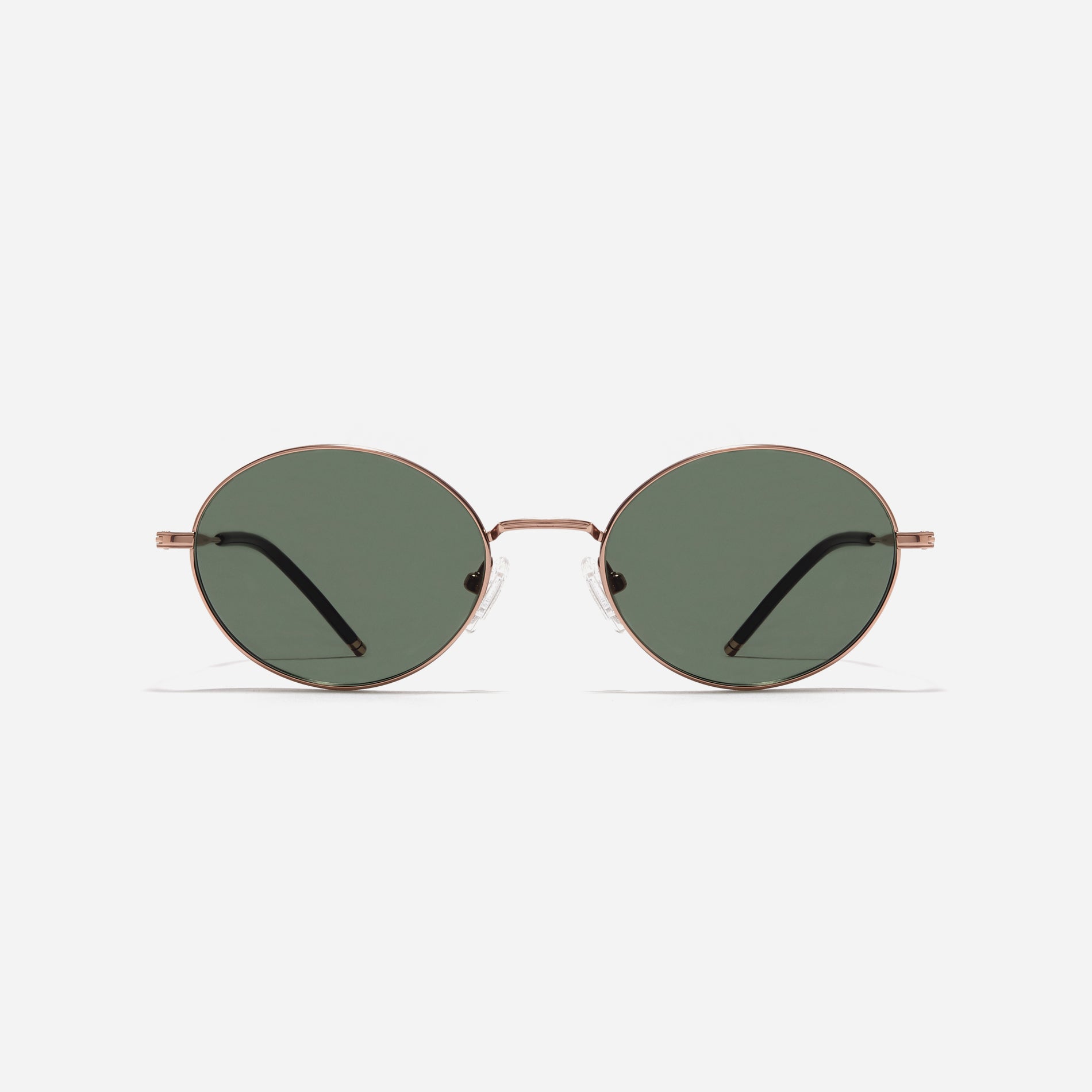 Tinted sunglasses with an oval frame crafted entirely from titanium.