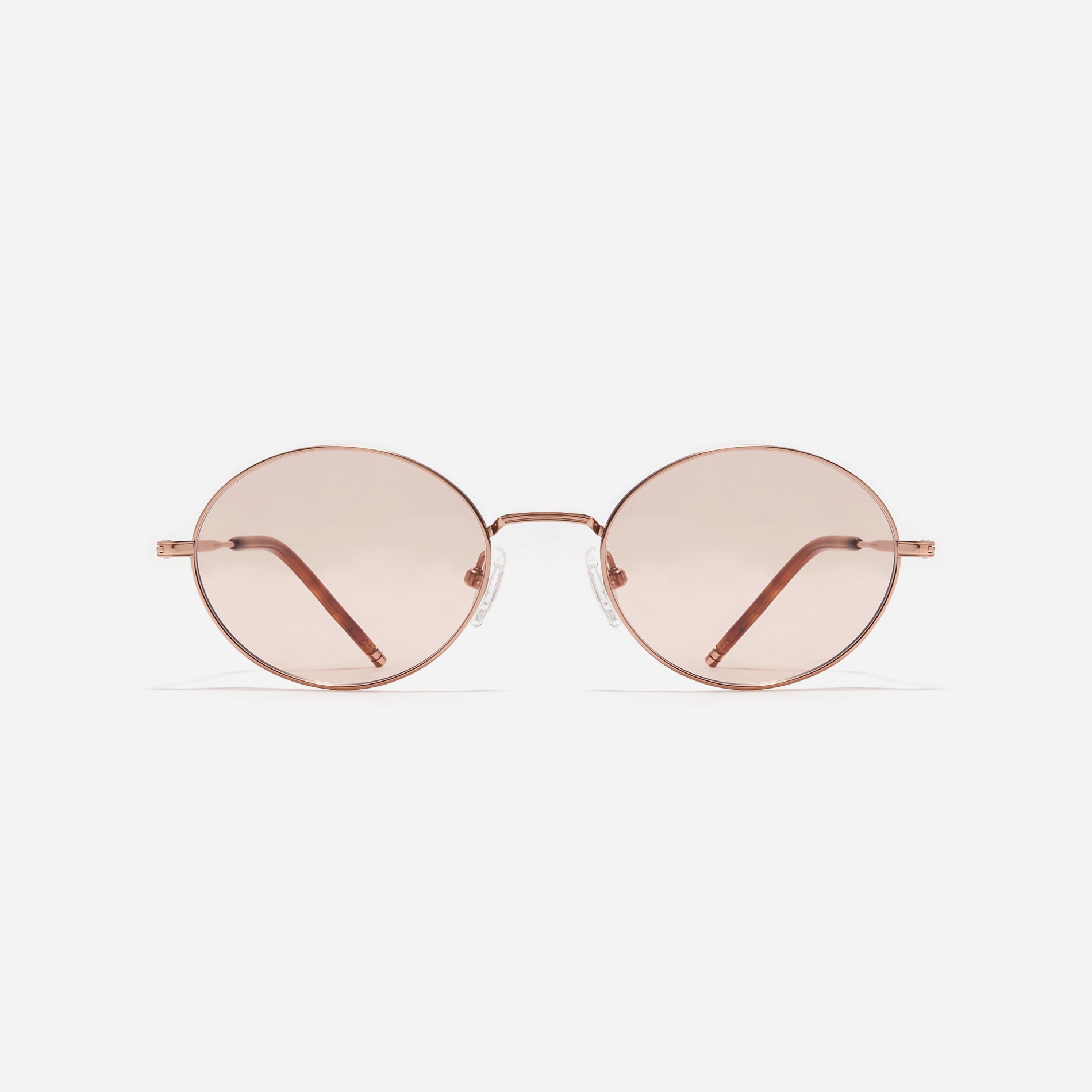 Tinted sunglasses with an oval frame crafted entirely from titanium.