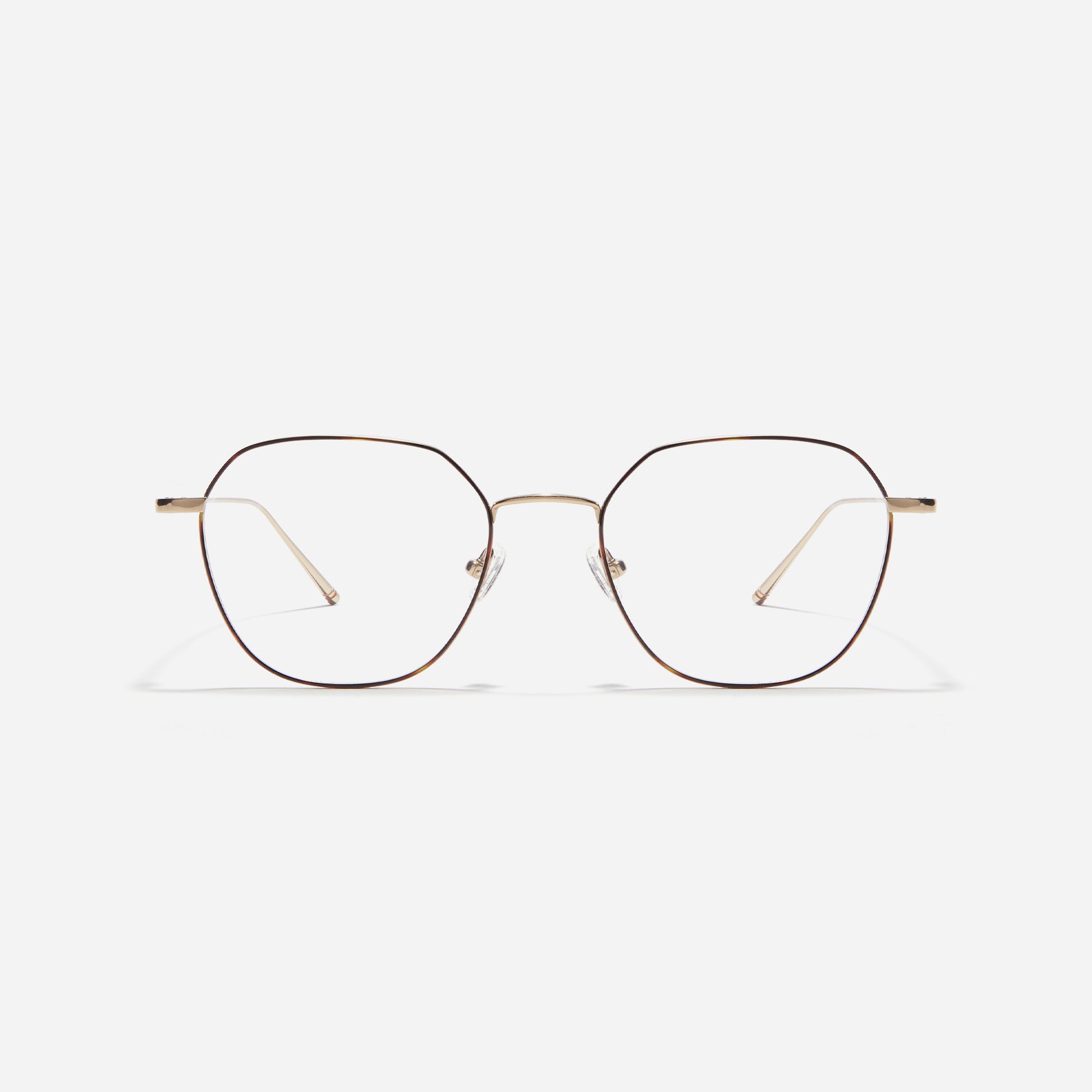 Norman glasses feature a polygonal shape with oversized rims. Crafted entirely from titanium, they are lightweight and comfortable to wear. Available in four different colors, these glasses offer fashionable styles suitable for both men and women.