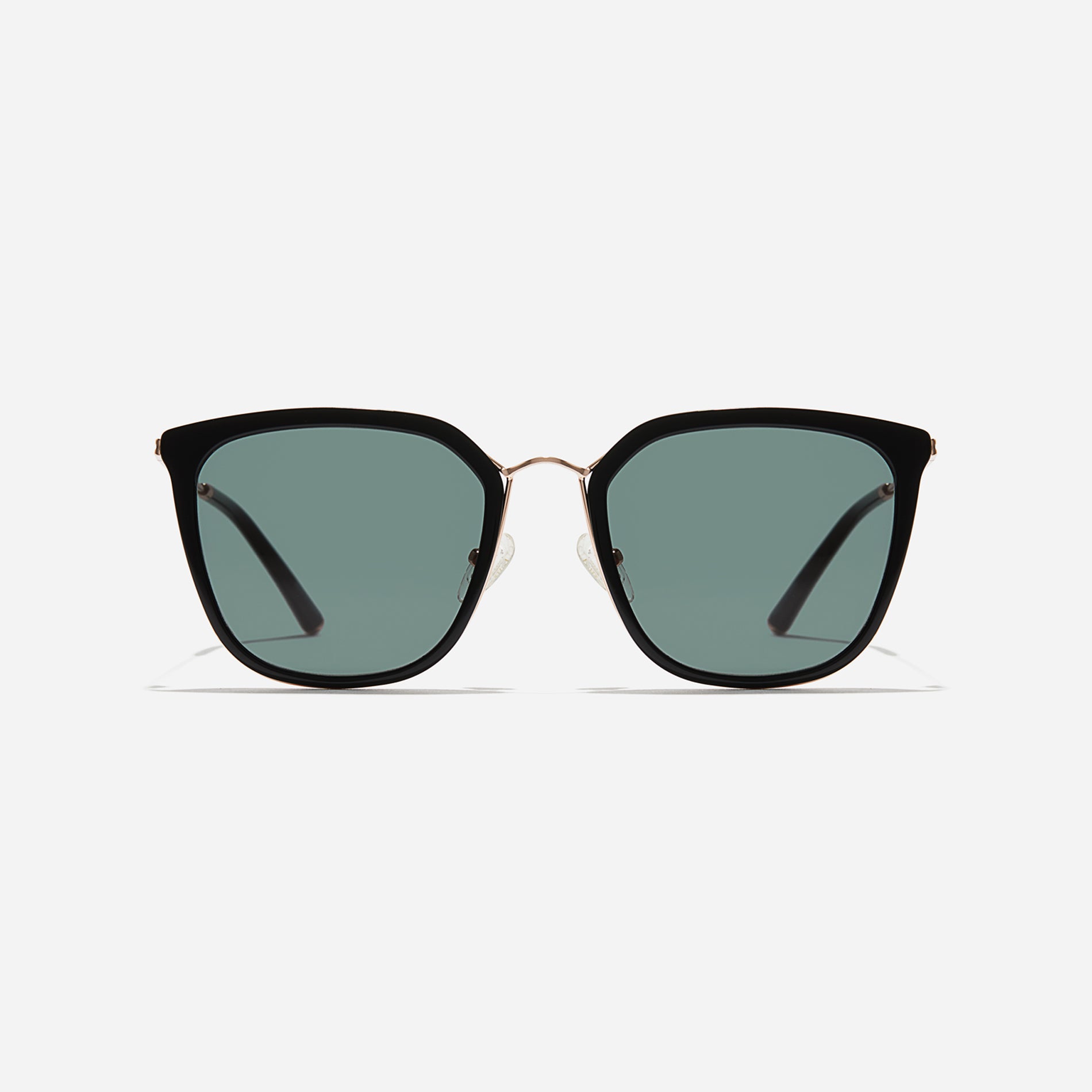Combination sunglasses featuring flat lenses that ensure 100% UV protection, and unique nose bridge details.