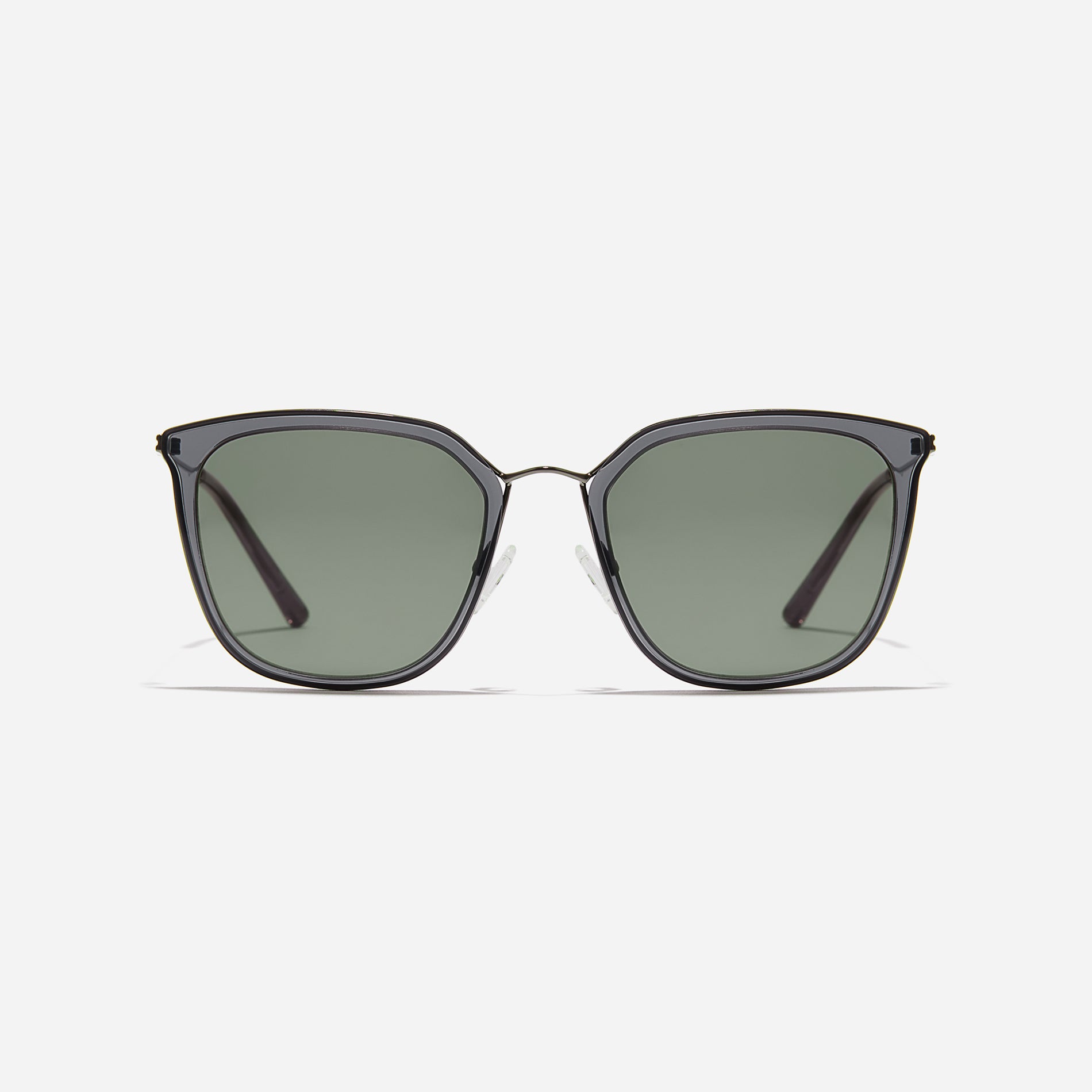 Round-shaped metal sunglasses that offer a soft and natural look with a peach-shaded titanium frame.
