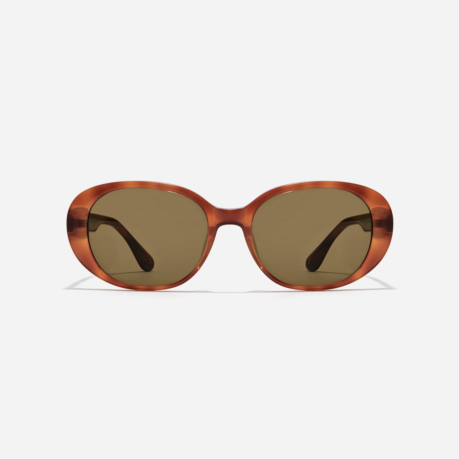 Oval-shaped petite frame sunglasses that feature a modern, unisex, and casual design that reinterprets retro sensibilities with a modern touch.