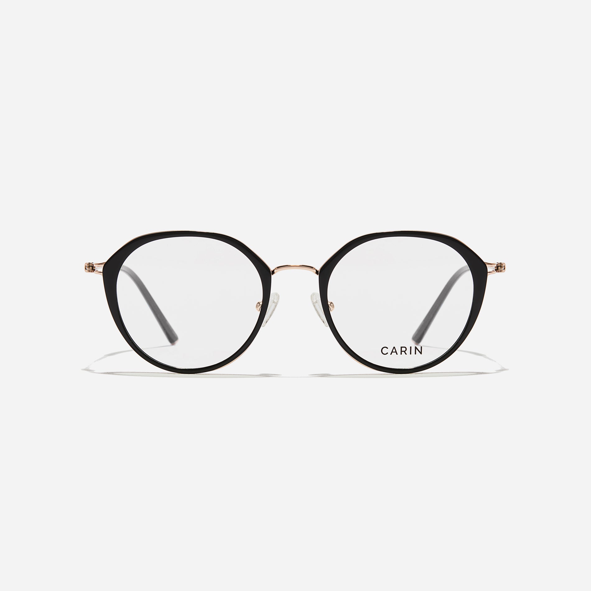Polygonal-shaped eyeglasses that feature a contrasting round lens design, offering a smooth yet refined style. They provide a comfortable wearing experience with slim temples made from lightweight and elastic B-Titanium material.
