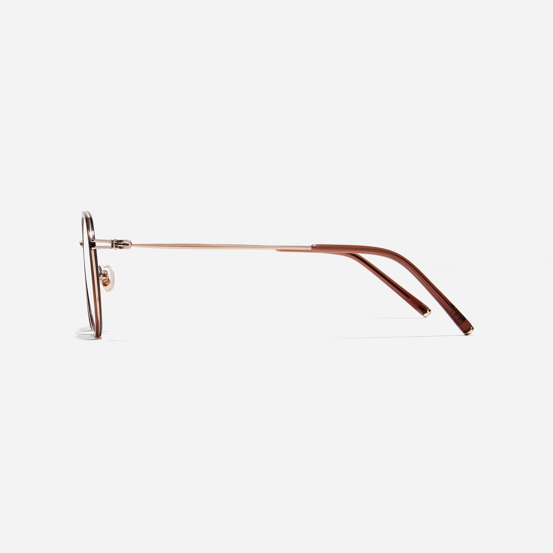 Polygonal-shaped eyeglasses that feature a contrasting round lens design, offering a smooth yet refined style. They provide a comfortable wearing experience with slim temples made from lightweight and elastic B-Titanium material.