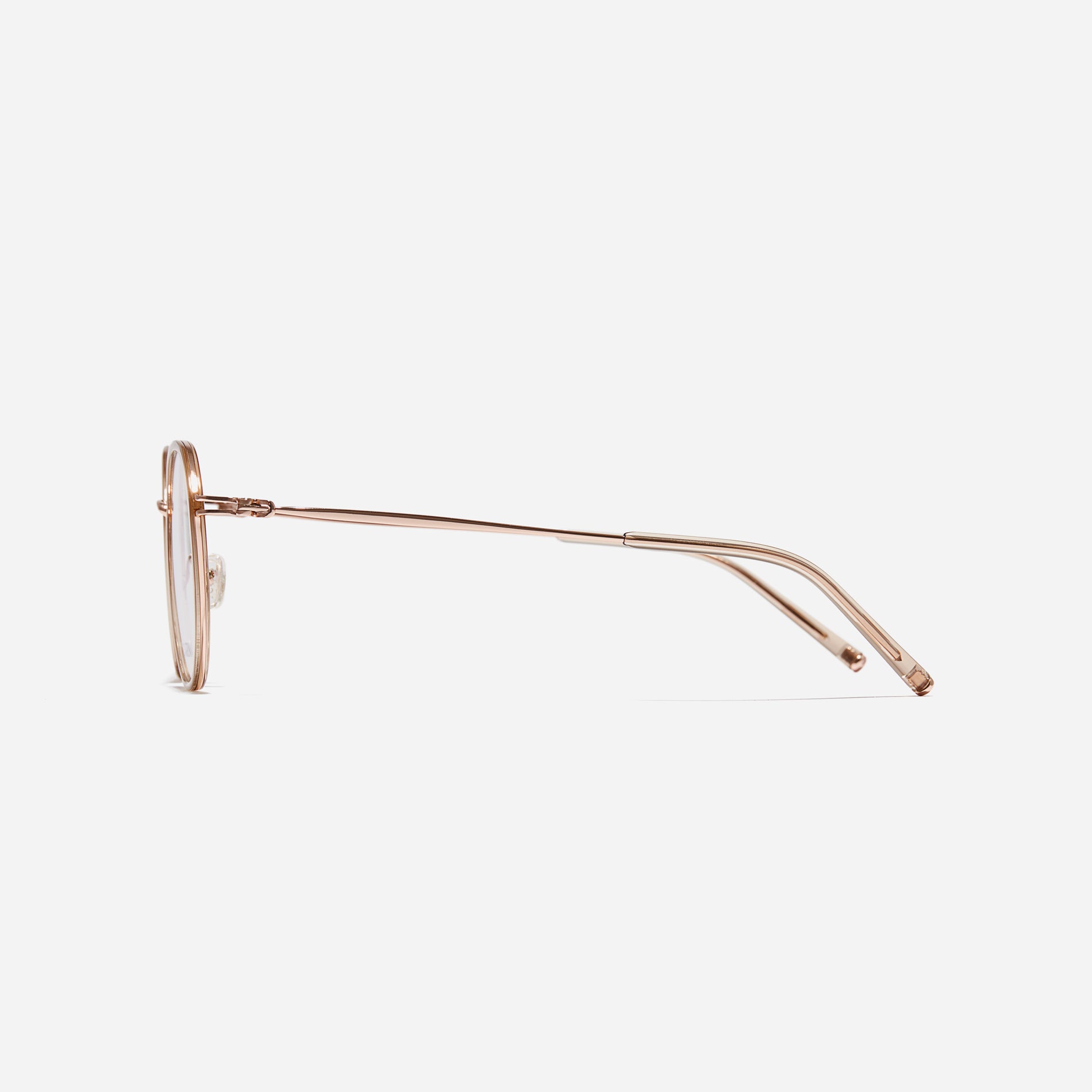 Polygonal-shaped eyeglasses that feature a contrasting round lens design, offering a smooth yet refined style. They provide a comfortable wearing experience with slim temples made from lightweight and elastic B-Titanium material.