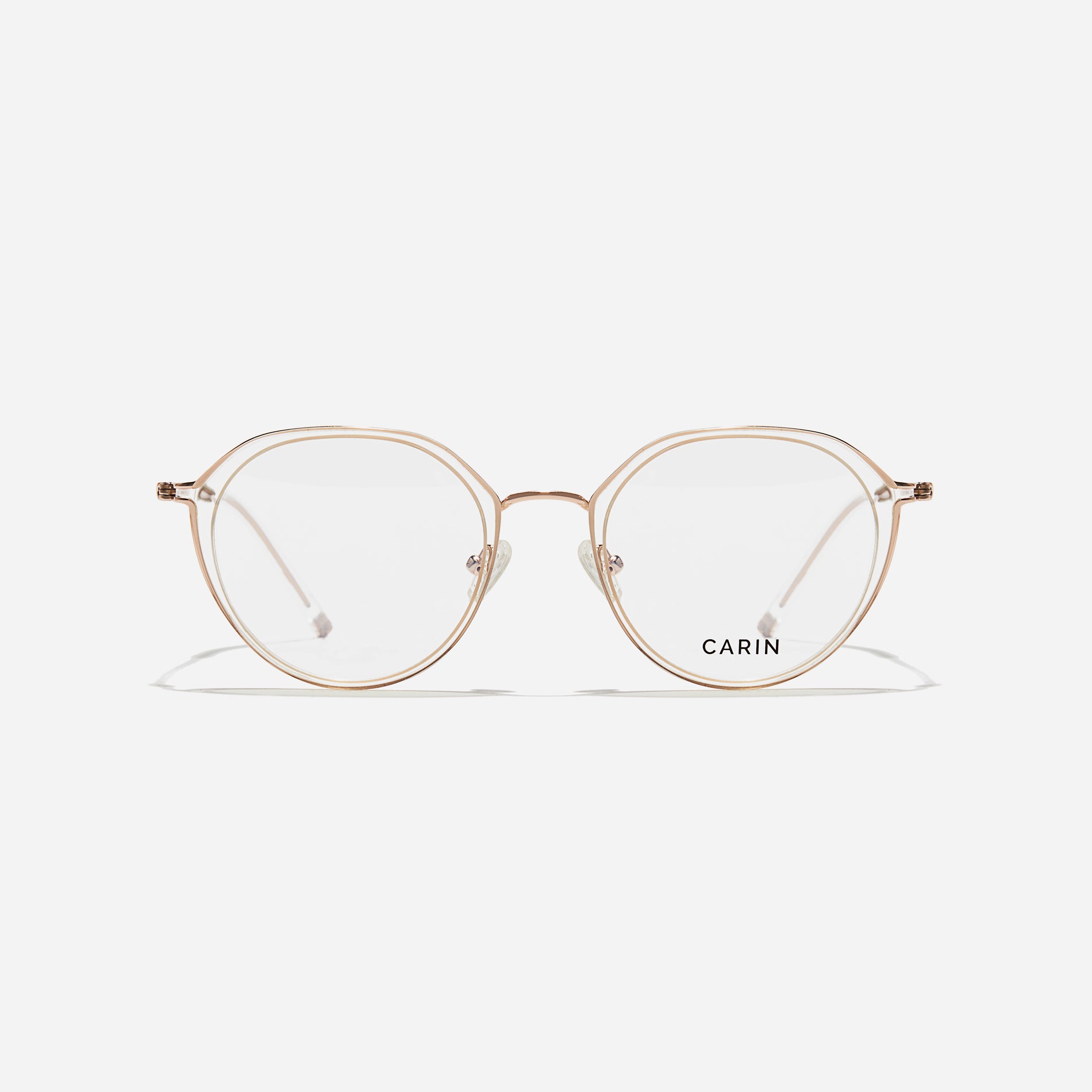 Polygonal-shaped eyeglasses that feature a contrasting round lens design, offering a smooth yet refined style. They provide a comfortable wearing experience with slim temples made from lightweight and elastic B-Titanium material.