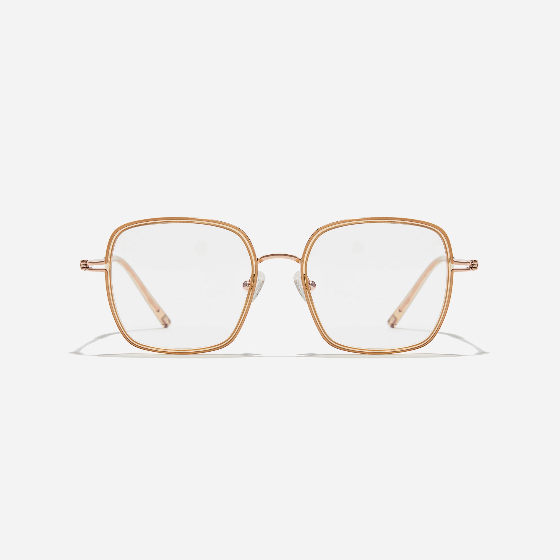 Rectangular-shaped oversized eyeglasses characterized by a delicate acetate rim that secures the frame and hinge details. The slim temples, made from lightweight and elastic B-Titanium material, ensure a consistently comfortable fit.