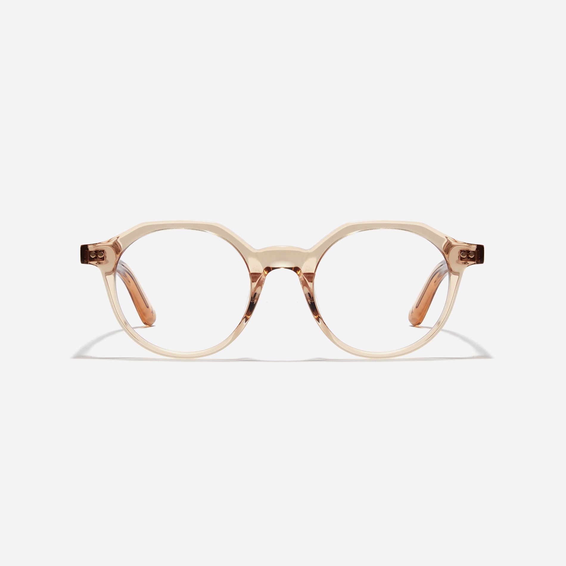 Polygon-shaped horn-rimmed eyeglasses. Embodying a modern reinterpretation of '90s retro vibes, their design is created for effortless styling.