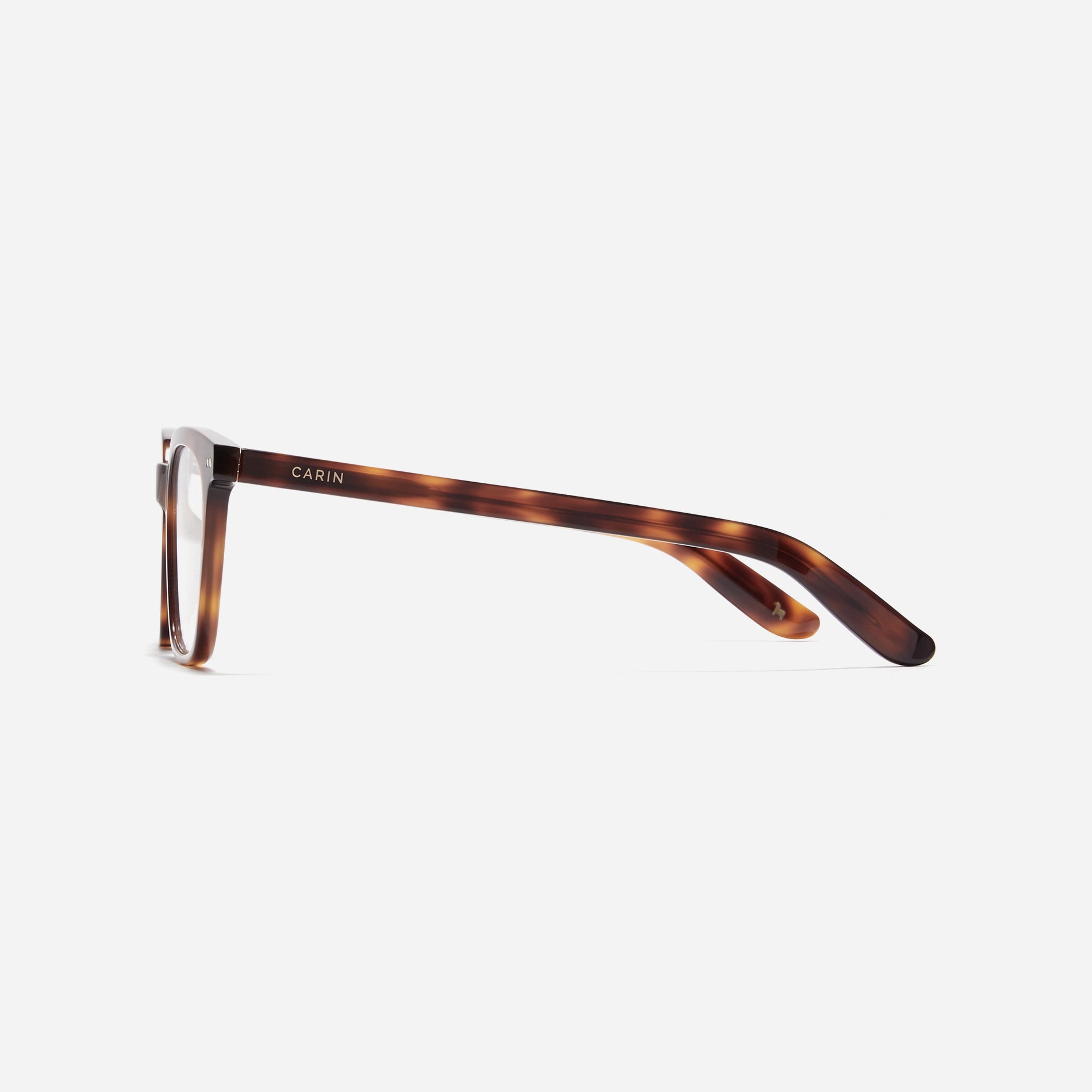 Square-shaped horn-rimmed eyeglasses. Embodying a modern reinterpretation of '91s retro vibes, their design is created for effortless styling. Featuring a distinctive bold frame and a stylish polygonal shape, these eyeglasses are available in a variety of colors.