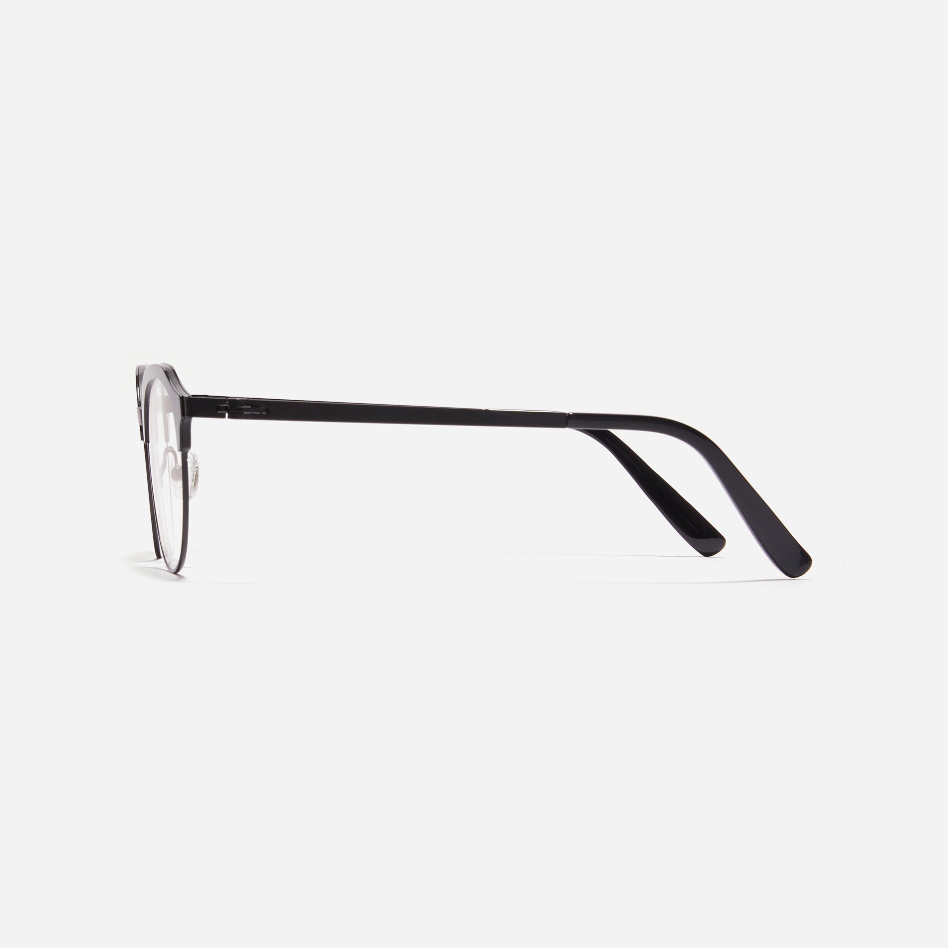 Lightweight polygon-shaped eyeglasses from CARIN's 'Feather Fit' line, offering a contemporary twist on the classic browline design.