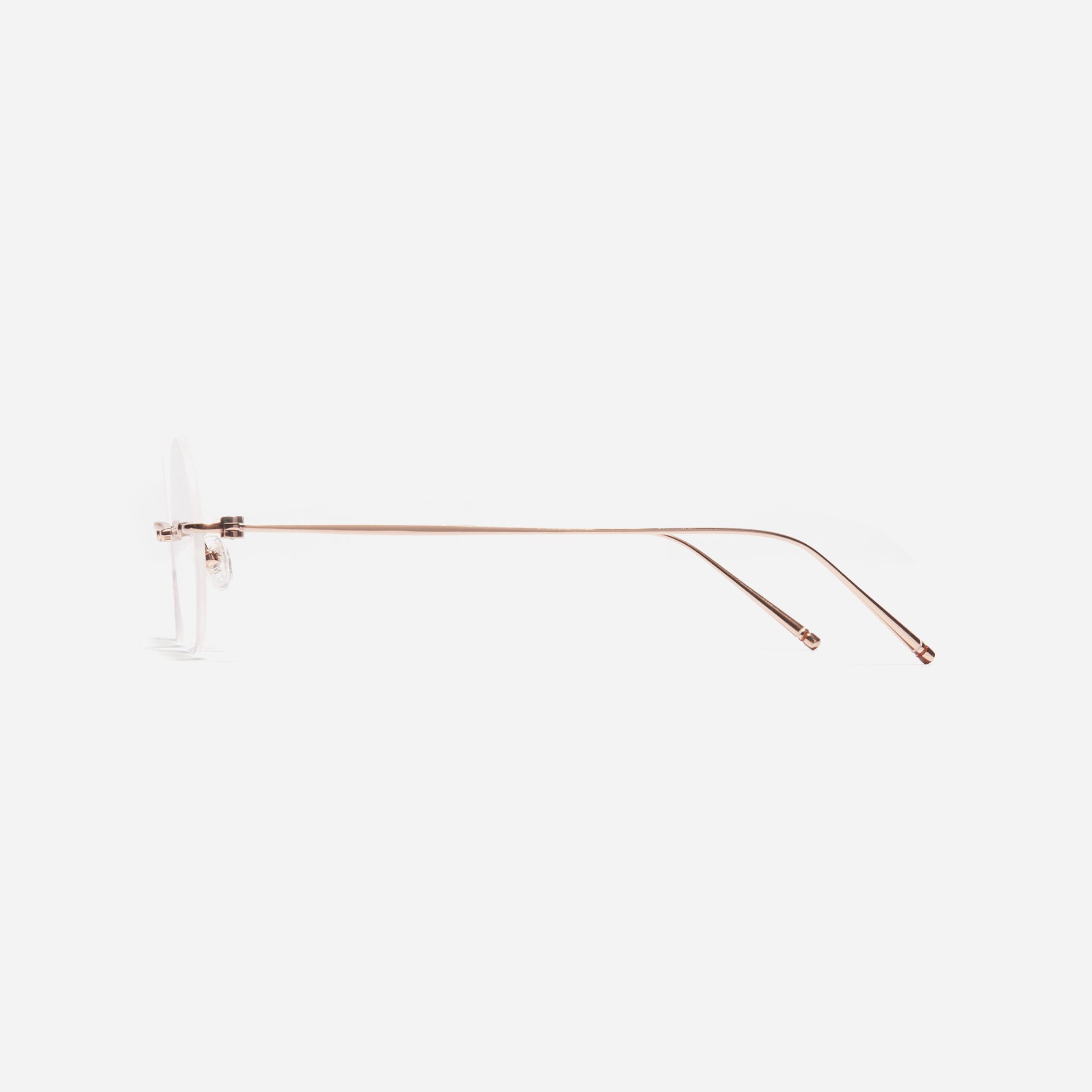 Rimless round-shaped retro eyeglasses. Featuring narrow rims and dual lining on the tips, these eyeglasses ensure a consistently comfortable fit and prevent slipping.