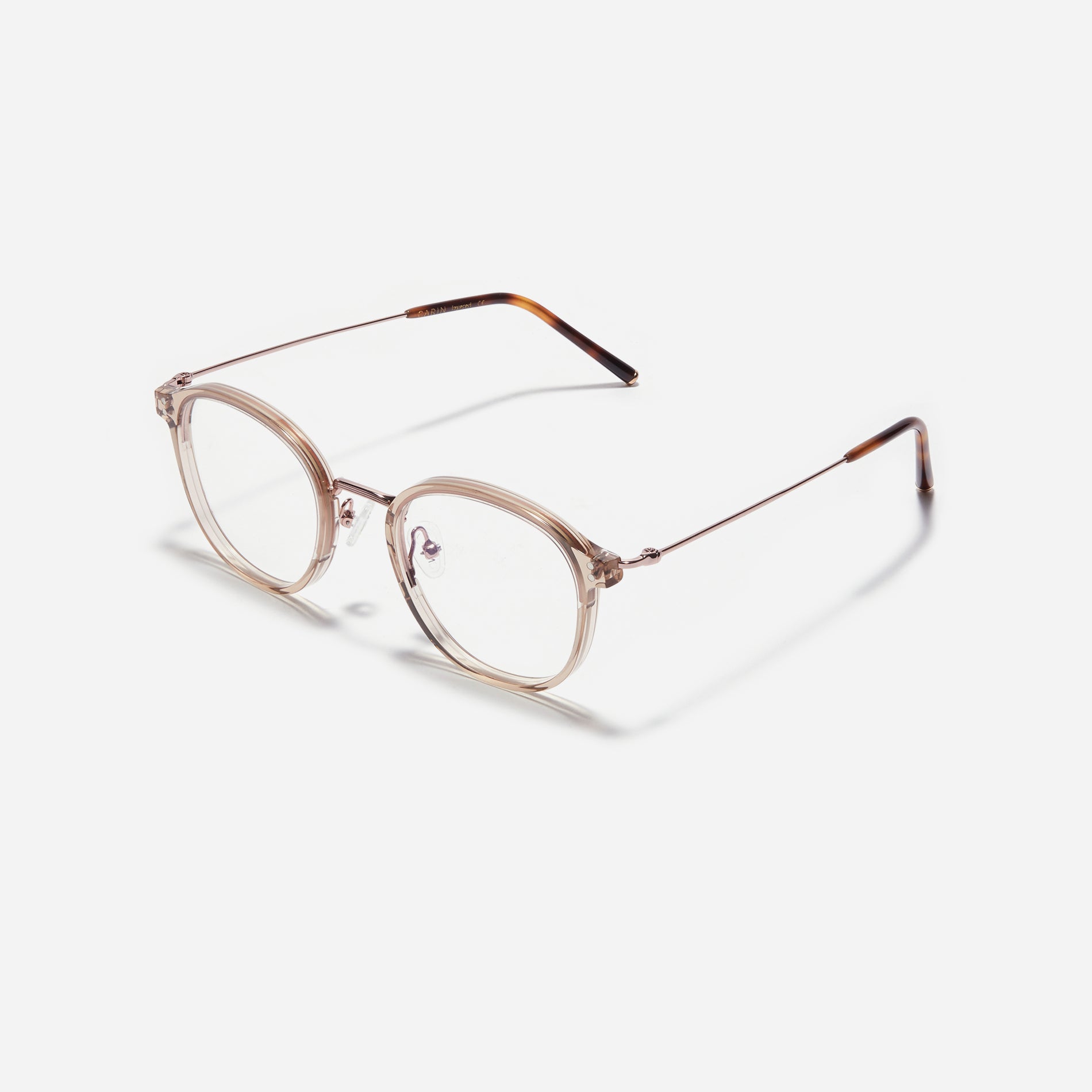 Square-shaped eyeglasses with a dual-combi structure inspired by from the aesthetics of platform shoes. Their dual-rim structure seamlessly accommodates thick lenses for higher prescriptions, while retro vibes are accentuated by side color accents applied using epoxy techniques.