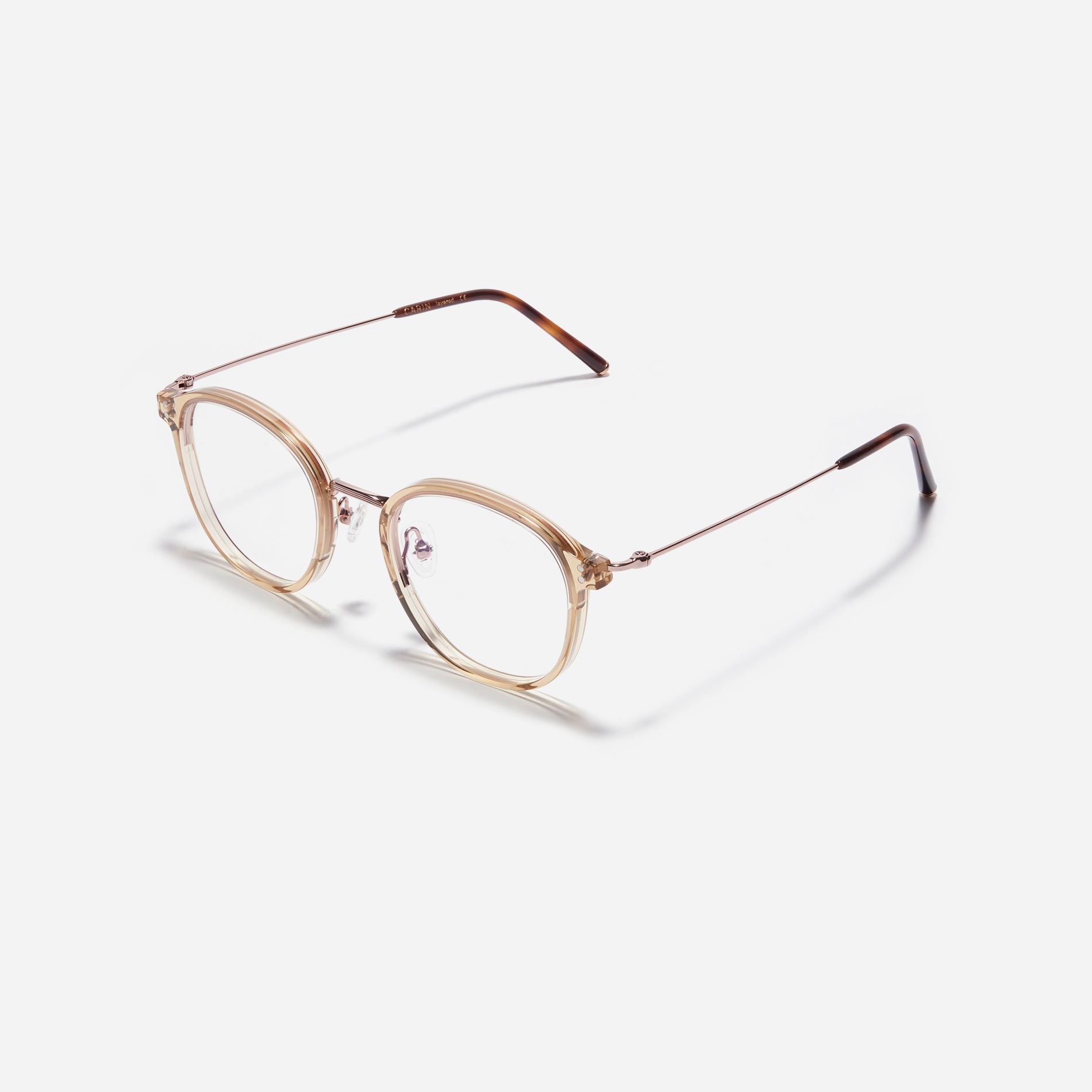 Square-shaped eyeglasses with a dual-combi structure inspired by from the aesthetics of platform shoes. Their dual-rim structure seamlessly accommodates thick lenses for higher prescriptions, while retro vibes are accentuated by side color accents applied using epoxy techniques.
