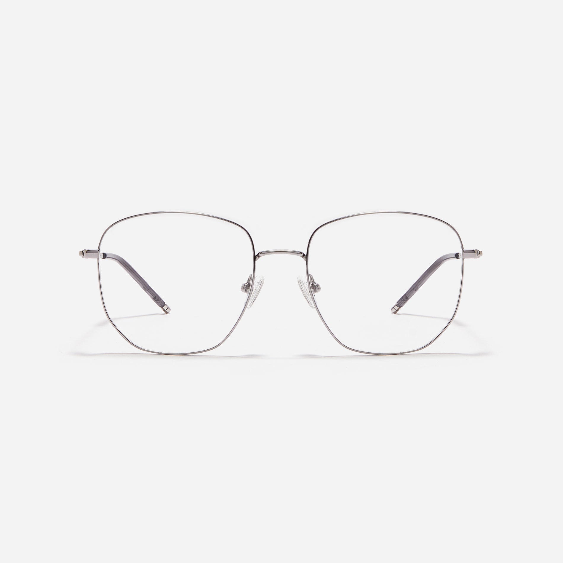 Square-shaped Boeing-style oversized eyeglasses crafted entirely from titanium for a lighter and more comfortable fit. With classic color options and frame design, these eyeglasses offer a retro style that effortlessly complements one's look.