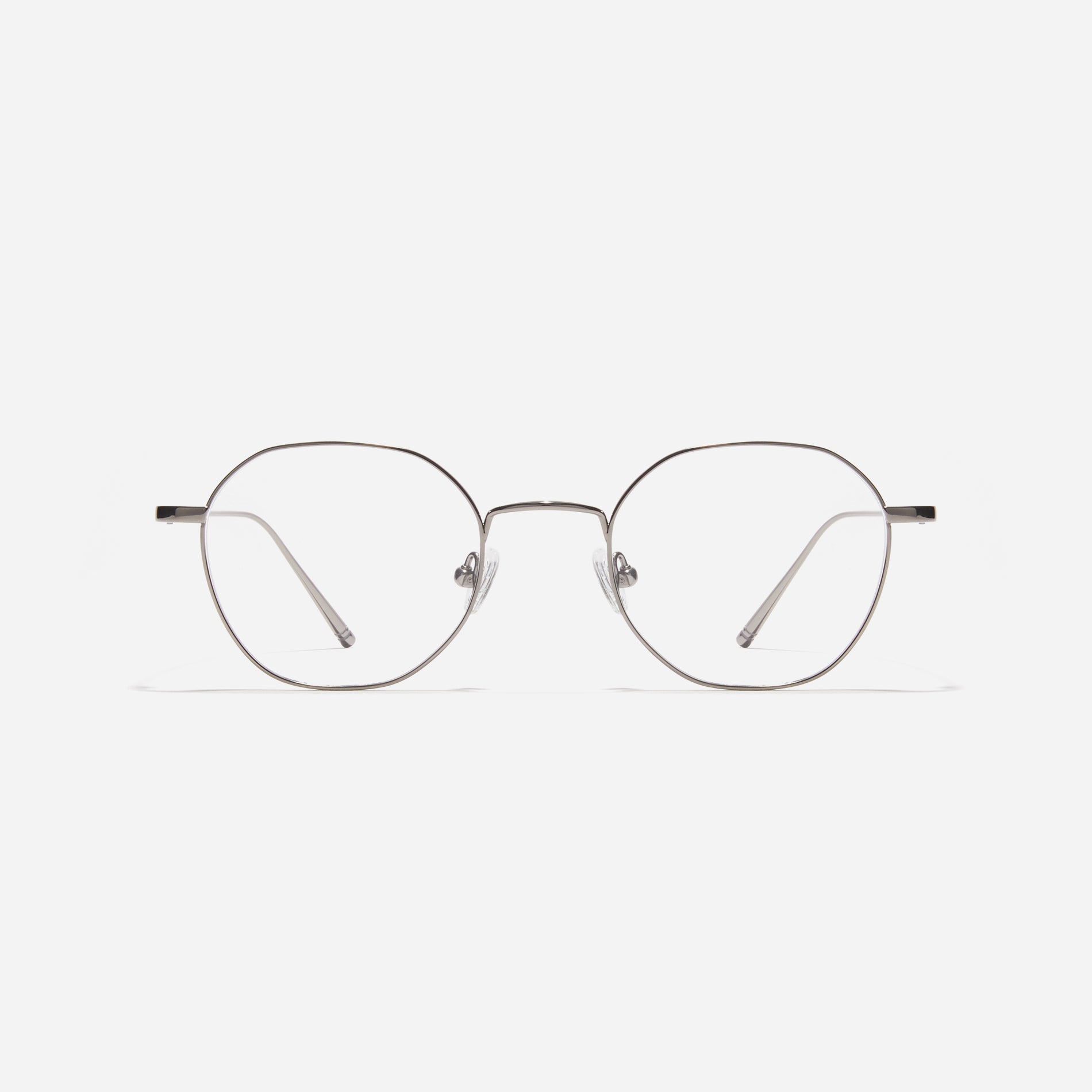 Gus H are hexagonal-shaped, full-metal eyeglasses with a dual-rim structure designed to accommodate thicker, high-prescription lenses. Both the frame and temples are made of pure titanium, ensuring a lightweight and comfortable fit.