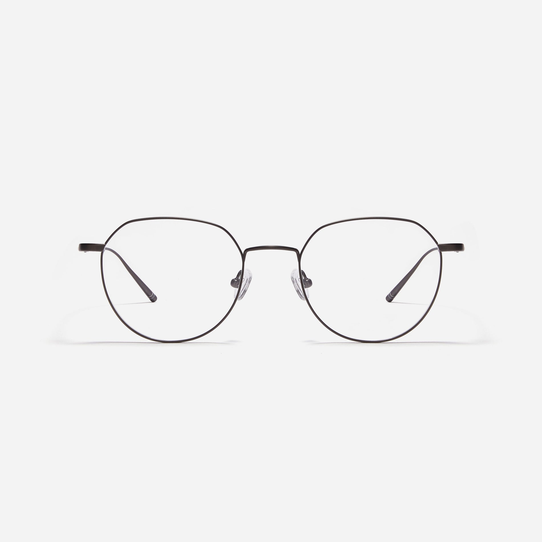 Polygonal-shaped, full-metal eyeglasses with a dual-rim structure designed to accommodate thicker, high-prescription lenses. Both the frame and temples are made of pure titanium, ensuring a lightweight and comfortable fit.